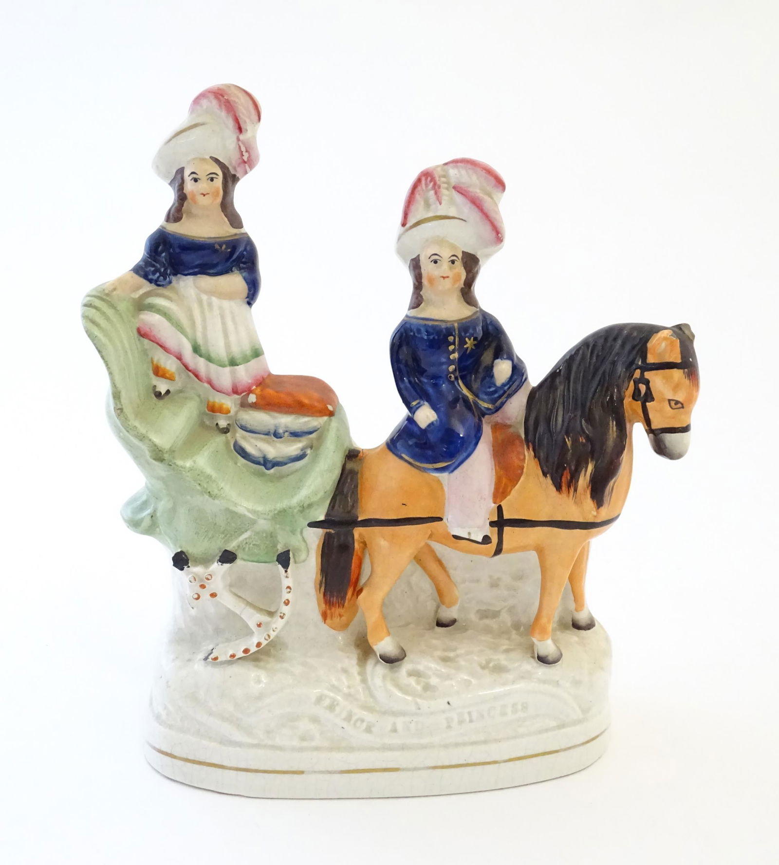 A Victorian Staffordshire pottery flat back figural group depicting the young Prince of Wales and (1 of 6)