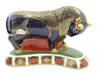 A Royal Crown Derby paperweight modelled as a Grecian Bull decorated in the Imari pattern with gilt