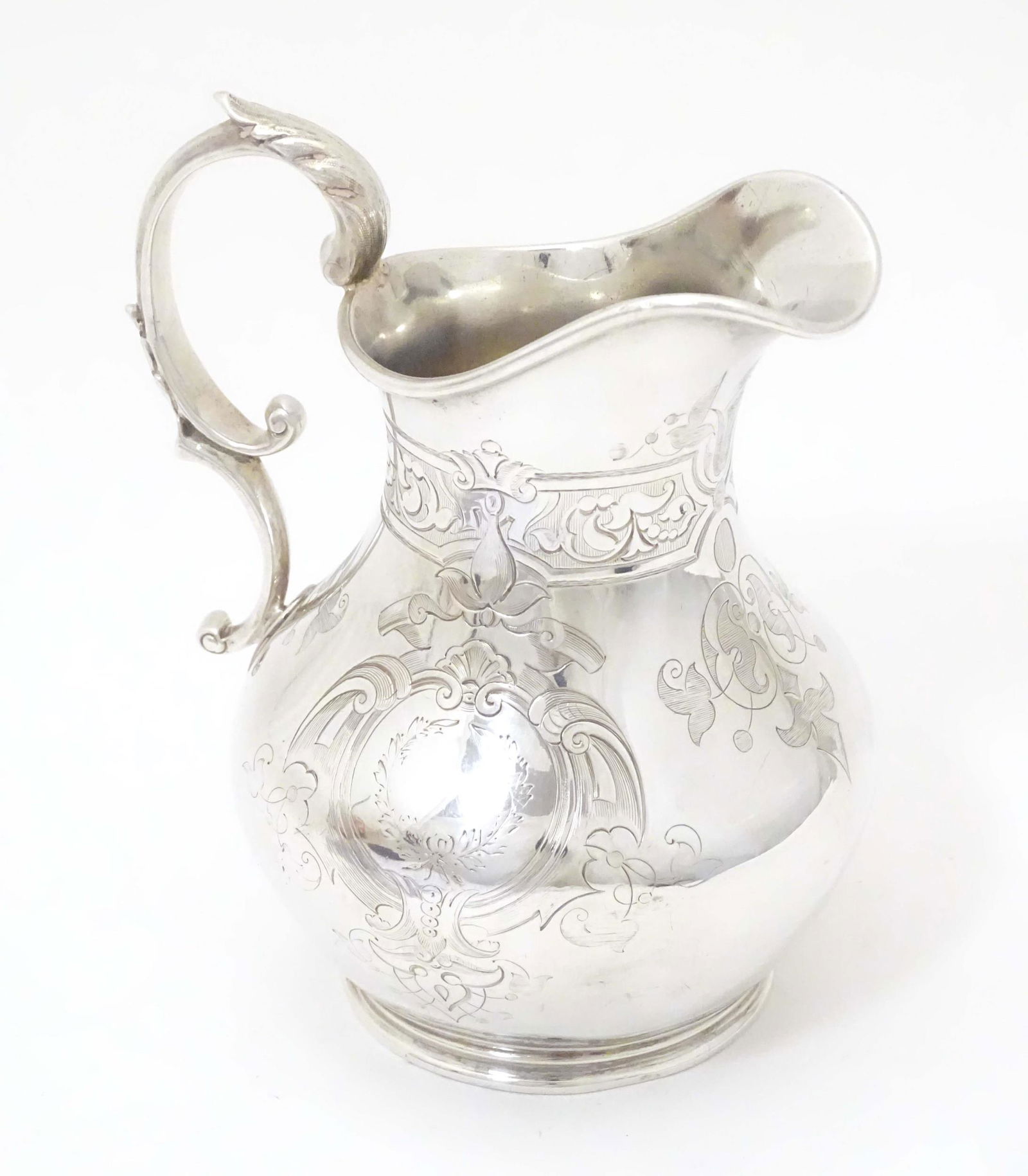 A Victorian silver cream jug with engraved decoration, hallmarked London 1860, maker George Richards (1 of 7)
