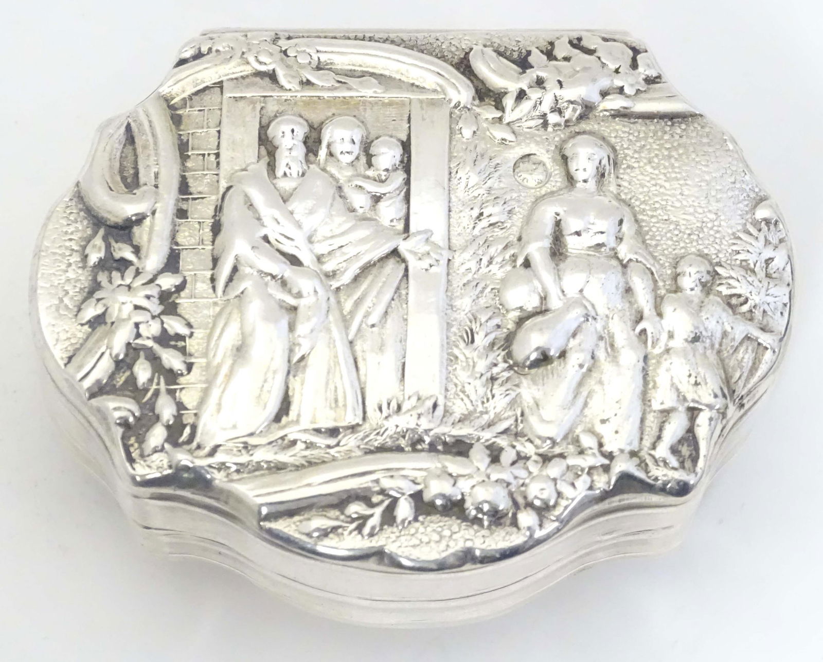 A 19thC Dutch silver snuff box with shell form detail to one side and figures to other. 2 1/2" wide (1 of 10)