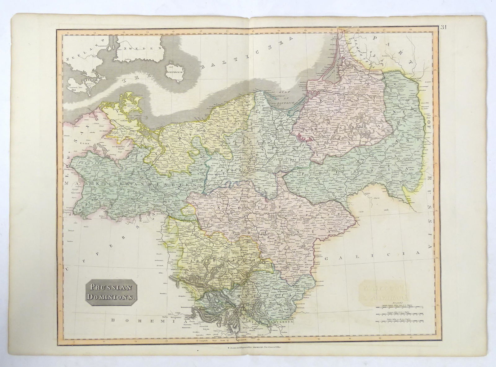 Map: A 19thC engraved map titled Prussian Dominions after John Thomson, for Thomson's New General: Map: A 19thC engraved map titled Prussian Dominions after John Thomson, for Thomson's New General Atlas, 1814, with hand coloured detail. Approx. 20" x 25 1/2"