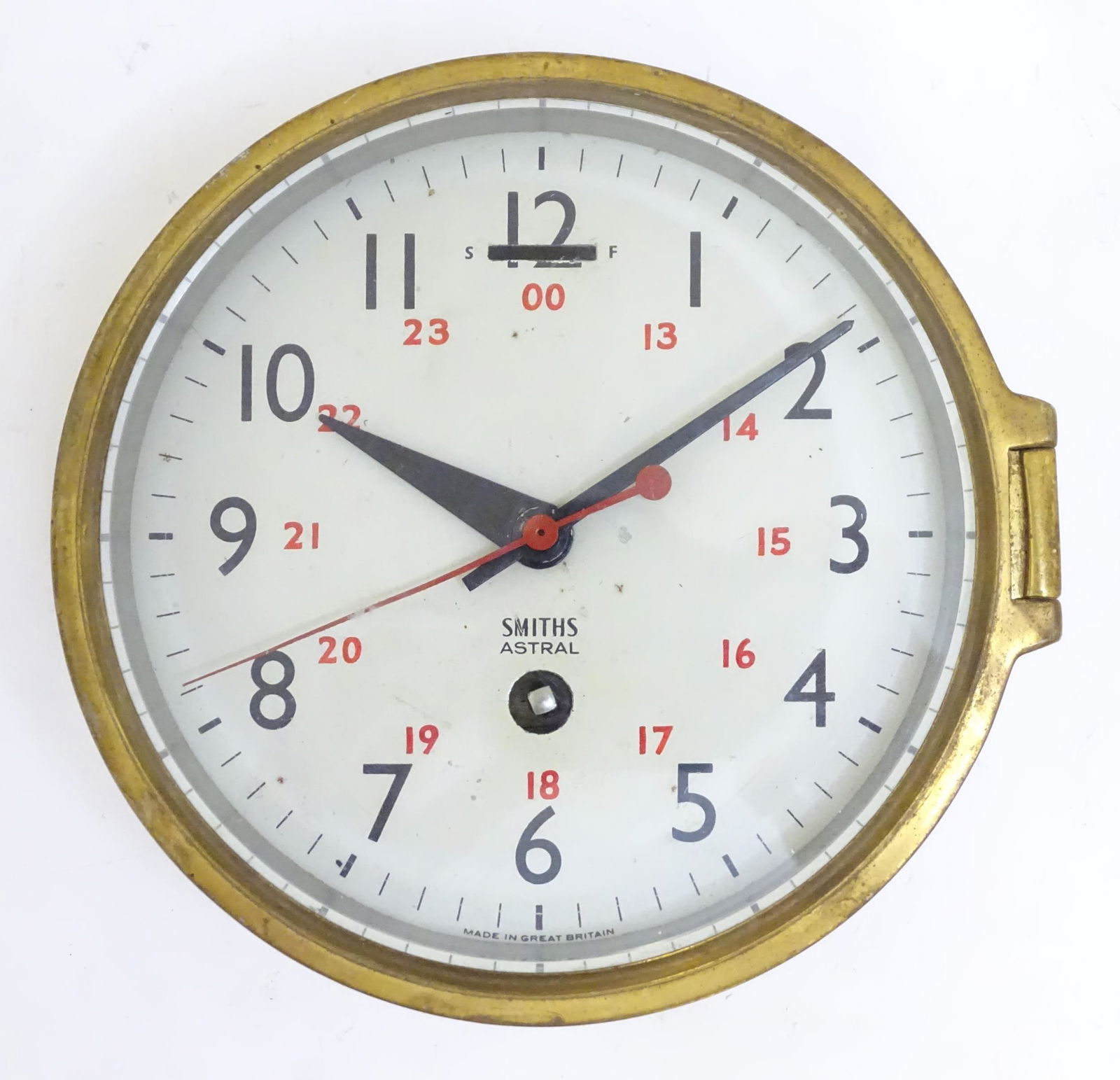 A Smiths Astral maritime / bulkhead clock the dial with black Arabic numbers to outer and red 24: A Smiths Astral maritime / bulkhead clock the dial with black Arabic numbers to outer and red 24 hour format Arabic numbers inner. Approx 7 1/2" diameter
