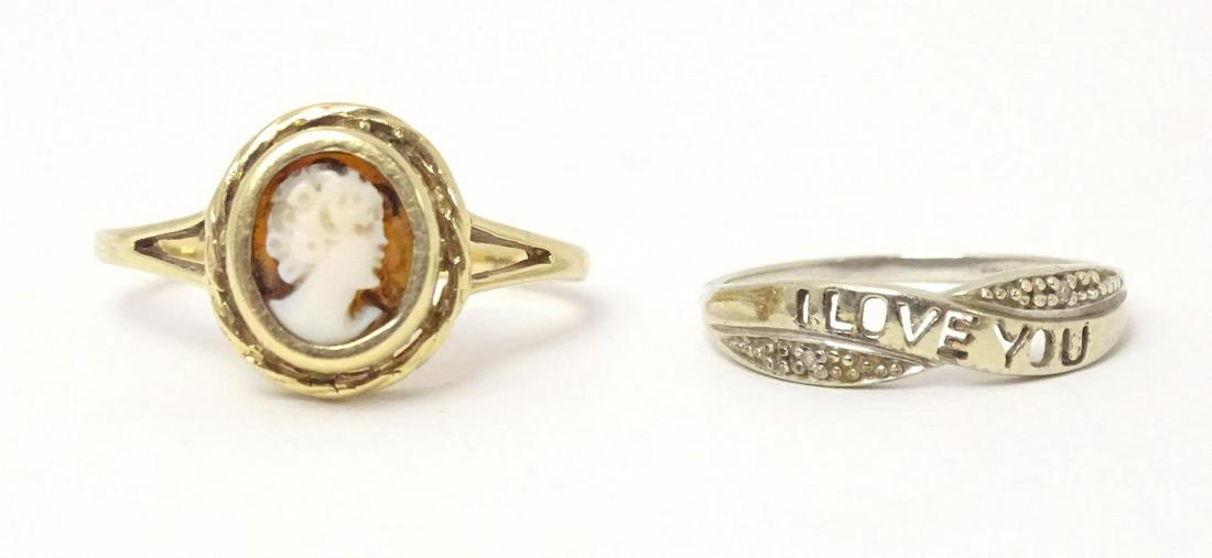 A 9ct gold ring set with cameo to top. Ring size approx. M 1/2 together with a white gold ring ( (1 of 10)