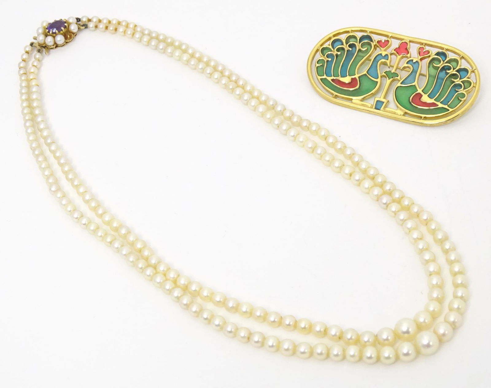 A two strand pearl necklace, the 9ct gold clasp having central amethyst. Together with a vintage (1 of 9)