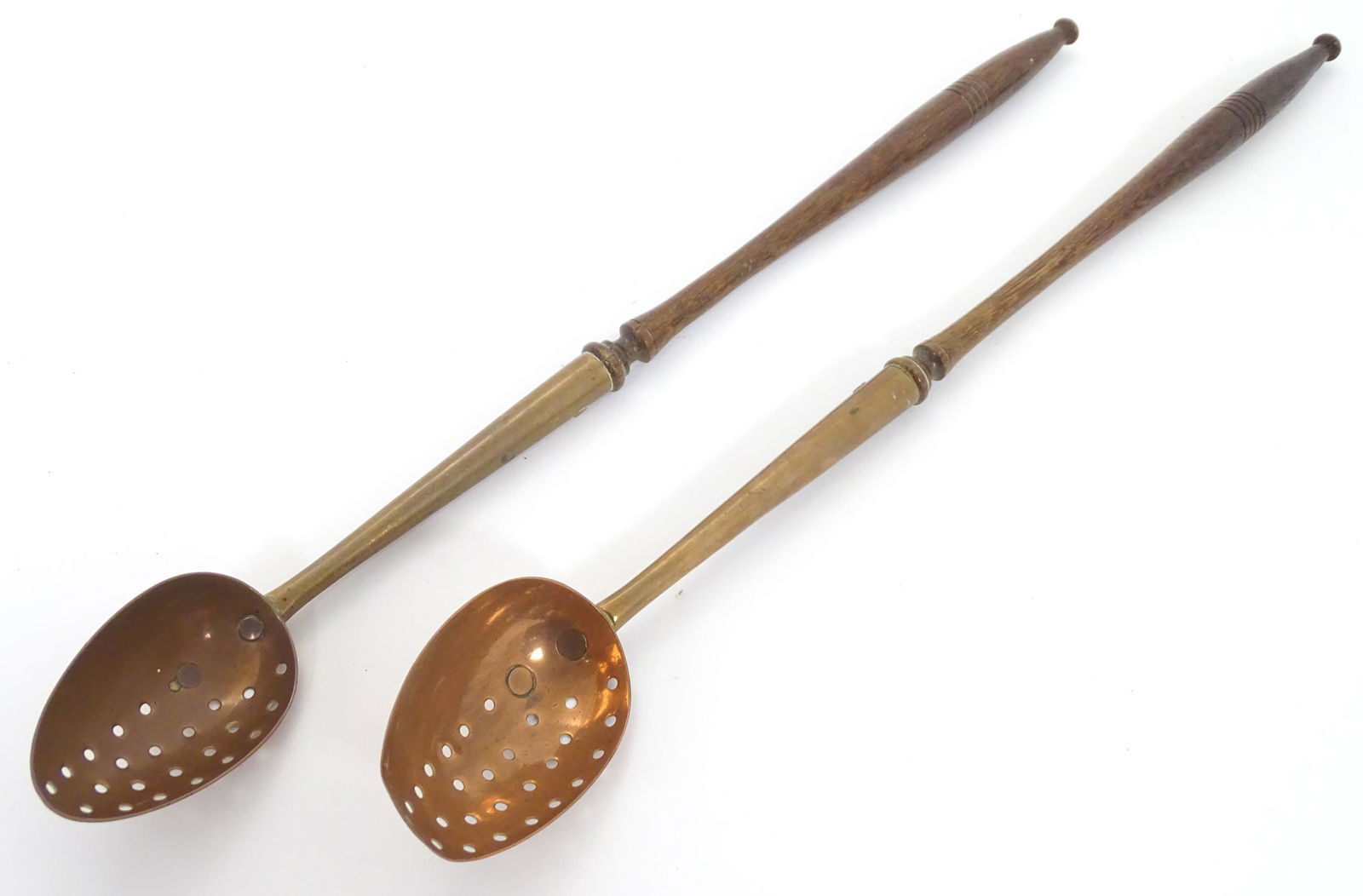 Two 19thC copper straining spoons with turned wooden treen handles. Largest approx. 20 1/2" long (2) (1 of 6)