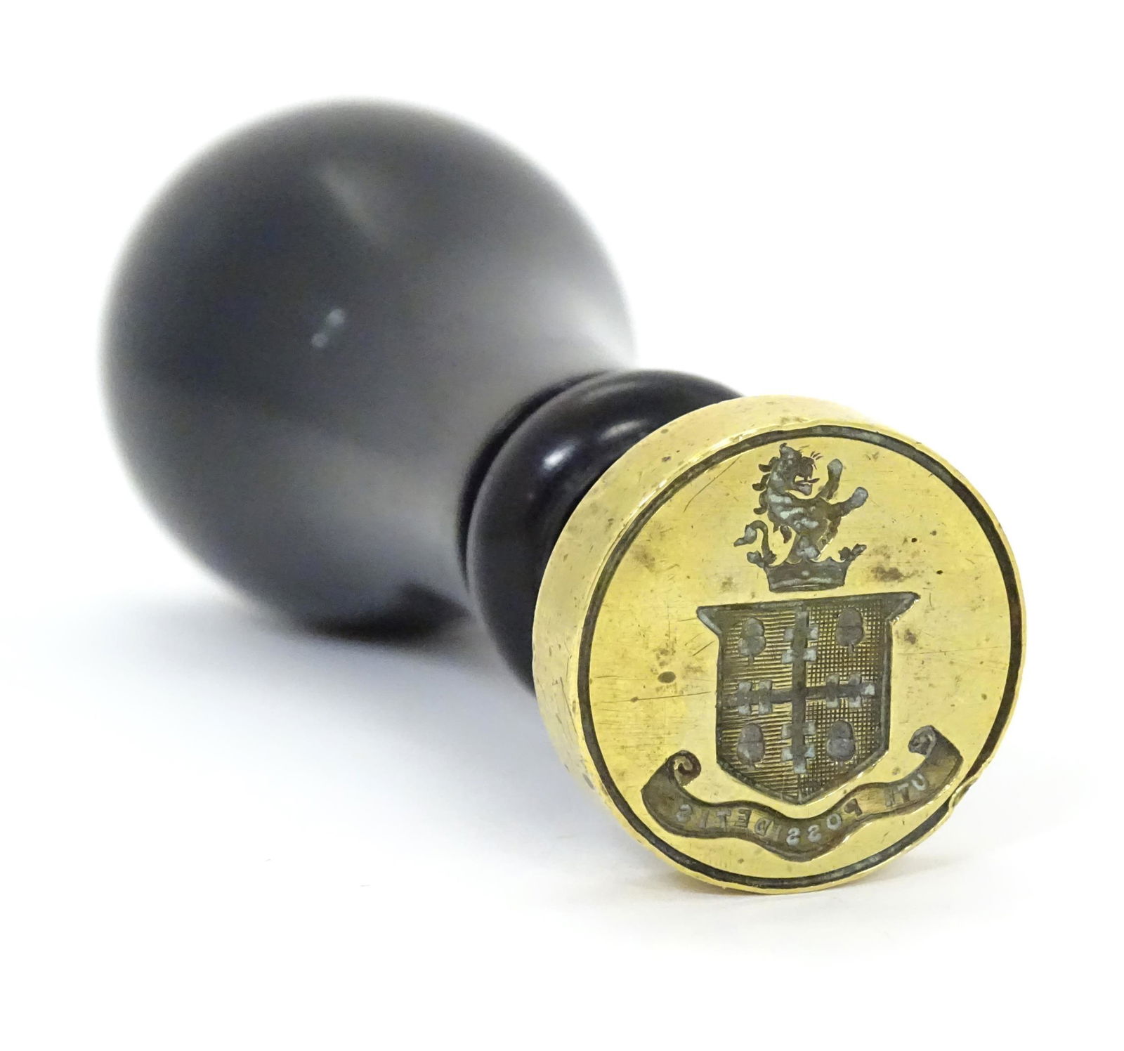 A Victorian desk / hand seal with an ebonised handle and brass seal with armorial / heraldic coat of (1 of 6)