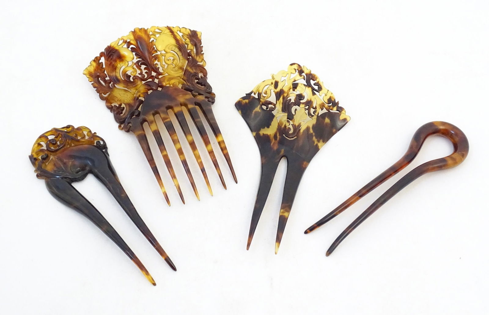 Four late 19th / early 20thC tortoiseshell and faux tortoiseshell mantilla hair combs, three with (1 of 5)
