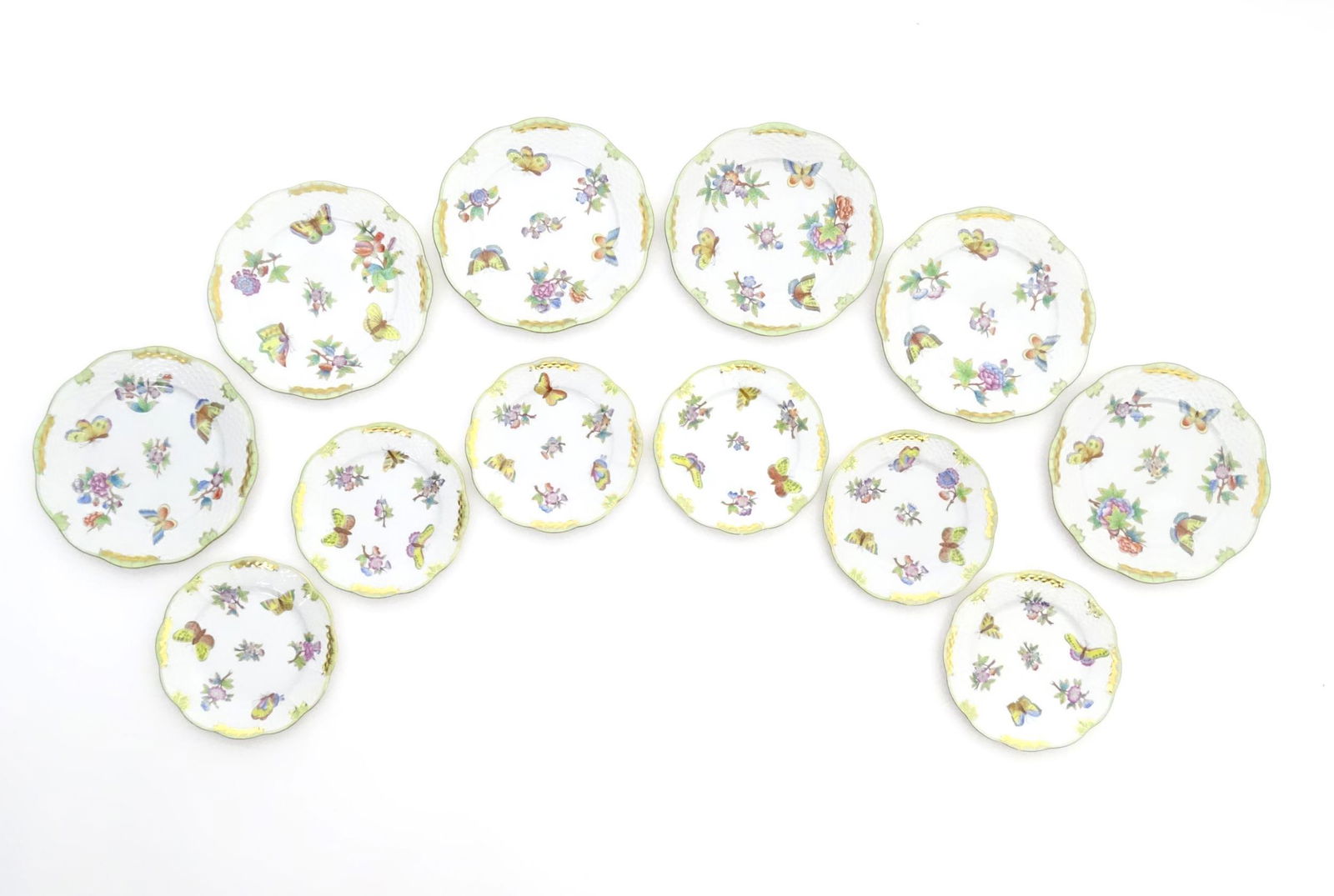 A quantity of Herend pottery coffee wares in the VBO Queen Victoria pattern decorated with flowers (1 of 19)