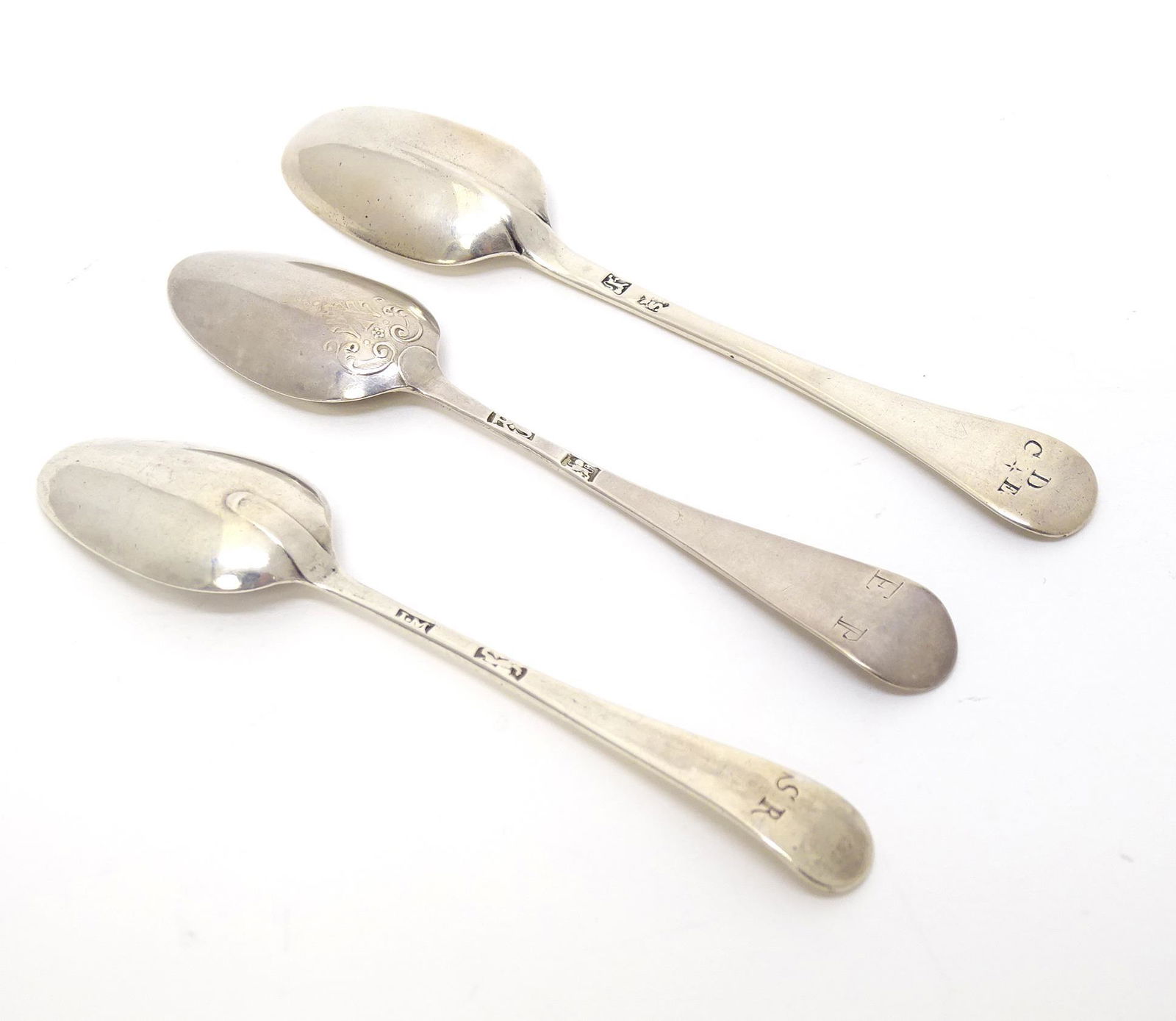 Three assorted 18thC silver teaspoons, to include a fancy back example. Largest approx. 4 1/2" long (1 of 6)