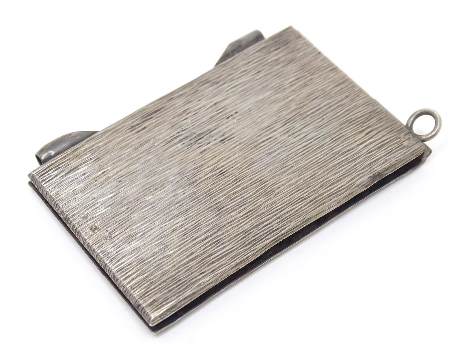 A Continental .800 silver aide de memoir notebook cover. Approx. 2 1/2" long  Please Note - we do (1 of 10)