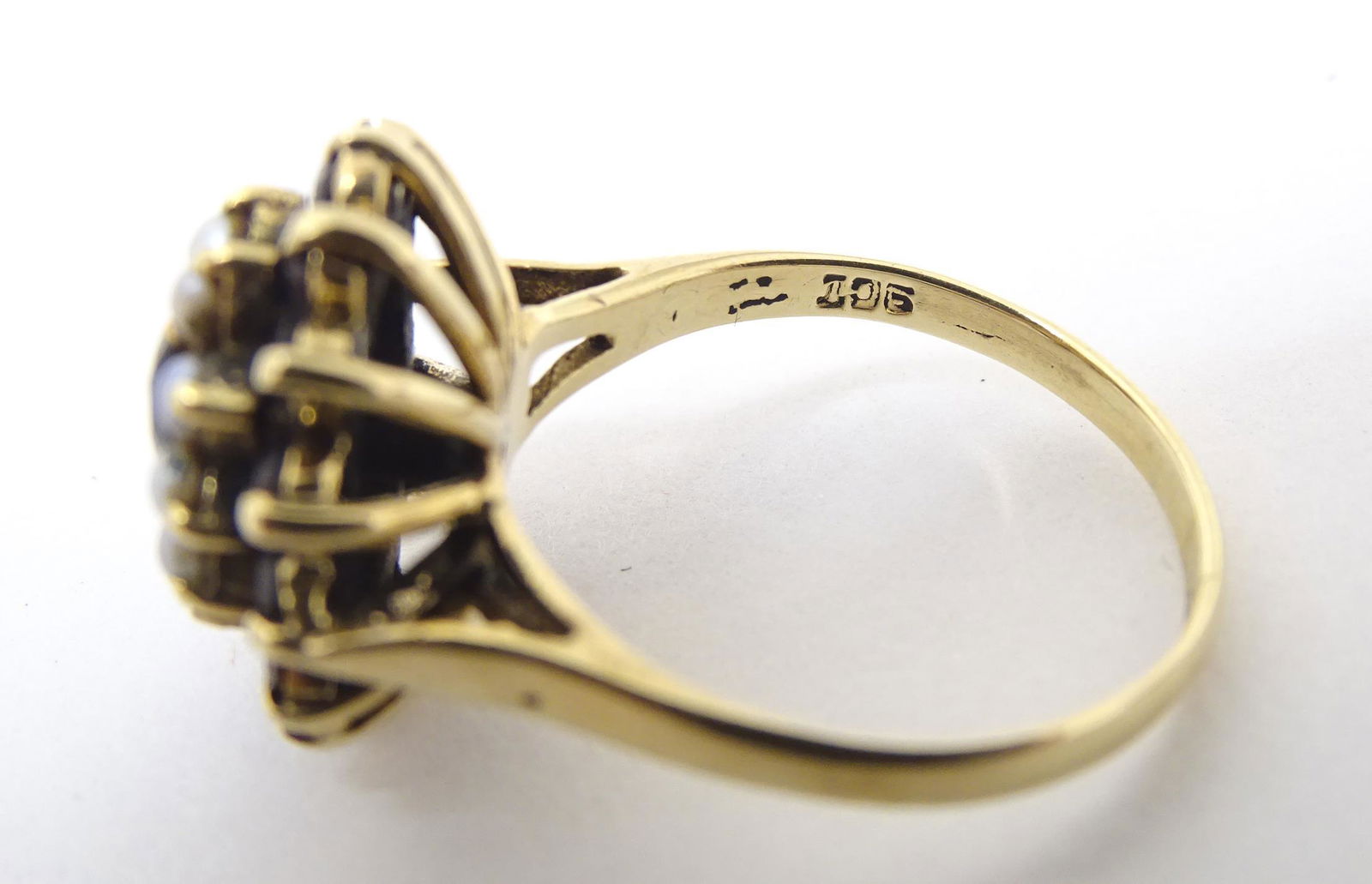 A 9ct gold ring set with garnets and seed pearls. Ring size approx P  Please Note - we do not make (1 of 4)