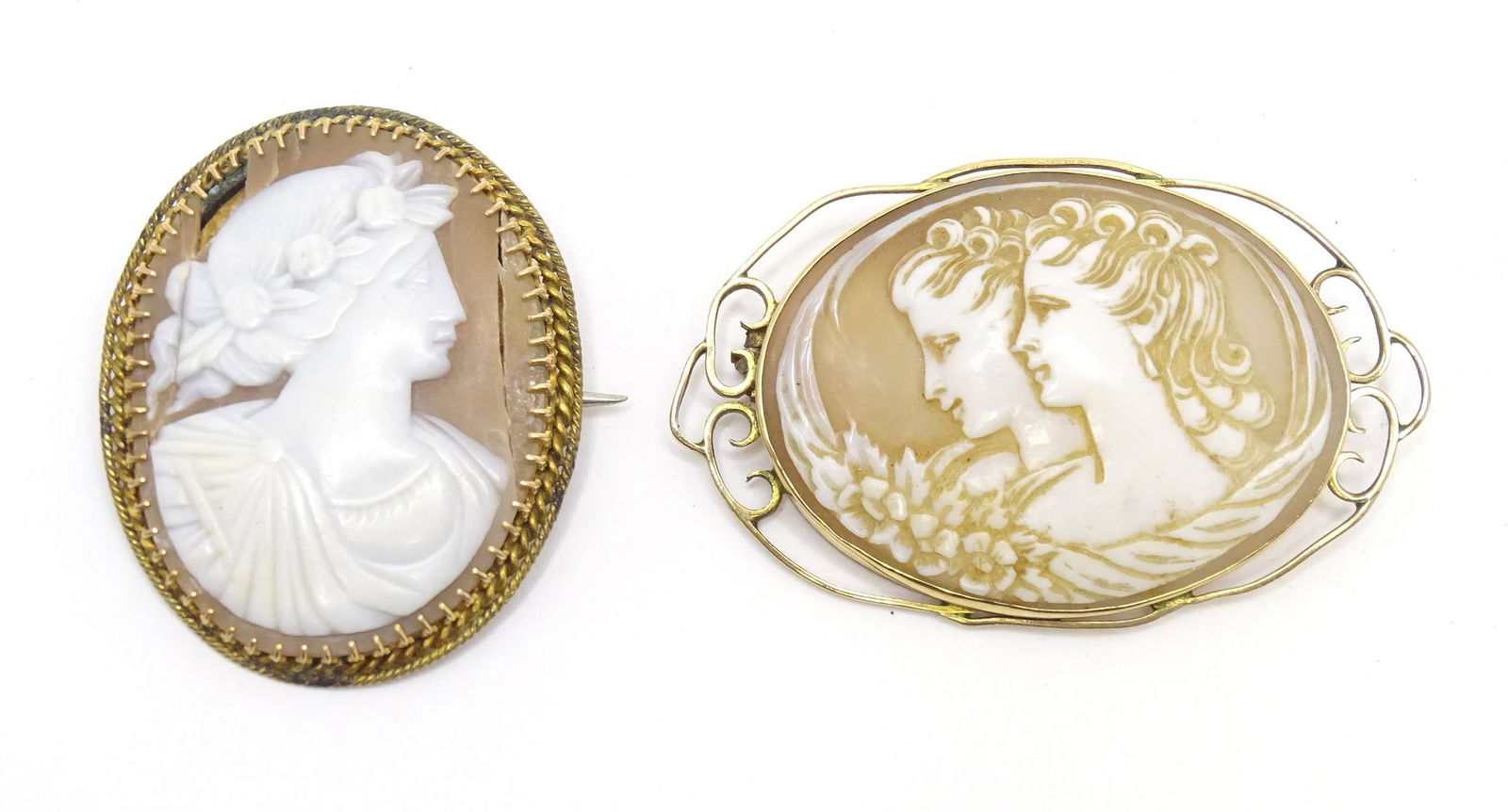 A shell carved cameo depicting two Classical maidens within a 9ct gold mount. Together with another. (1 of 8)