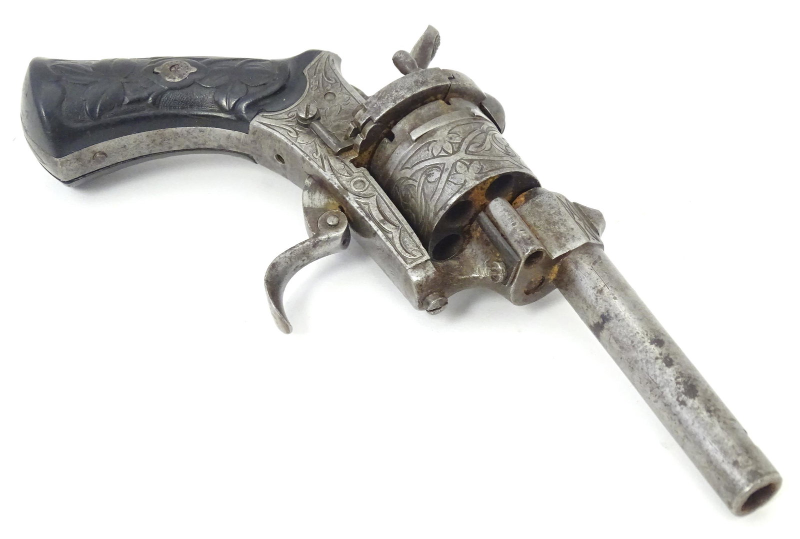 Militaria / Arms & Armour : a 19thC Belgian 15mm pinfire pocket revolver, 3 1/4" barrel, the action: Militaria / Arms & Armour : a 19thC Belgian 15mm pinfire pocket revolver, 3 1/4" barrel, the action with folding trigger and six shot cylinder, the chamber heads bearing Liege proof marks and makers A