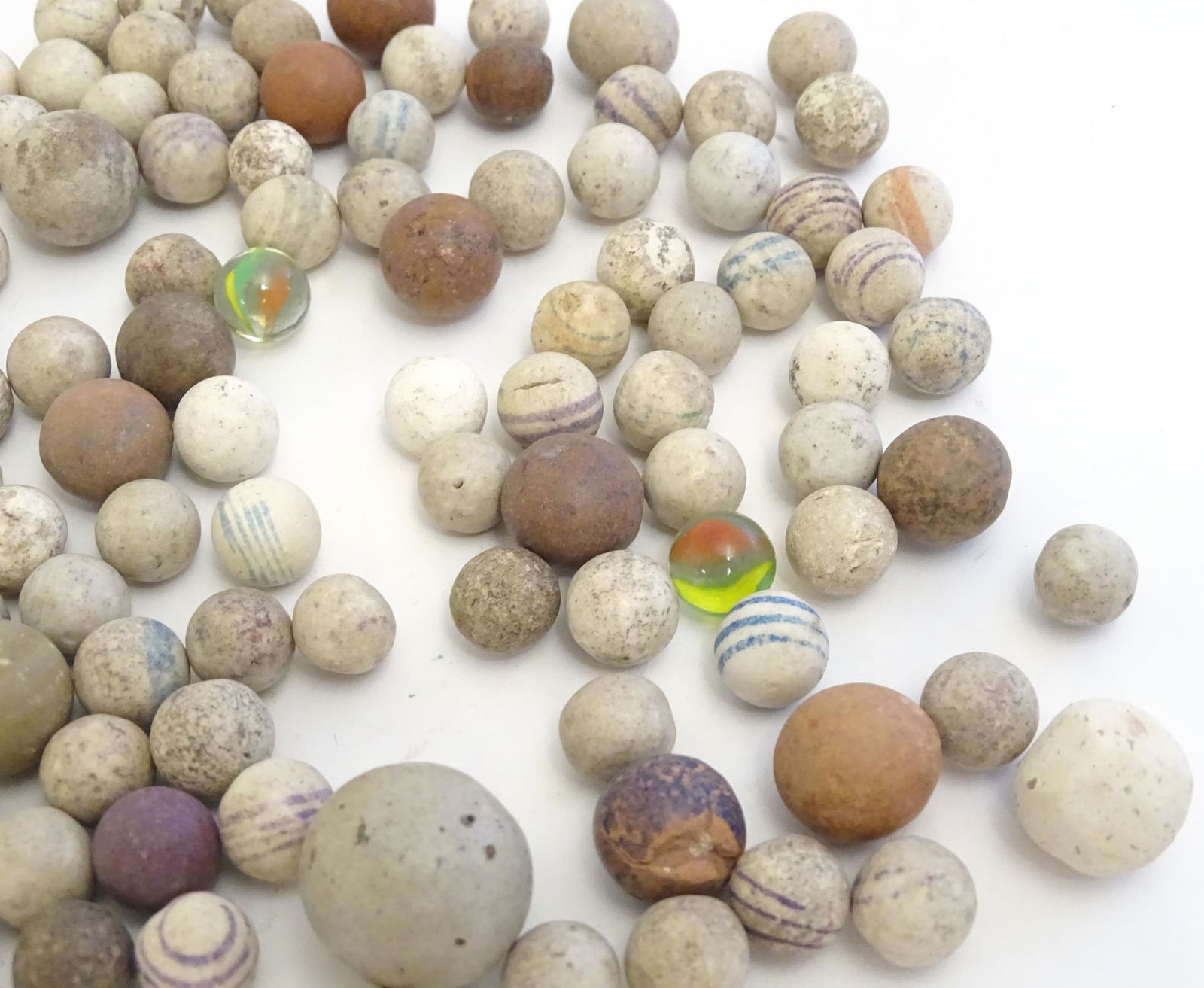 Toys: A quantity of assorted Victorian marbles to include hand painted ceramic examples, etc. (1 of 2)
