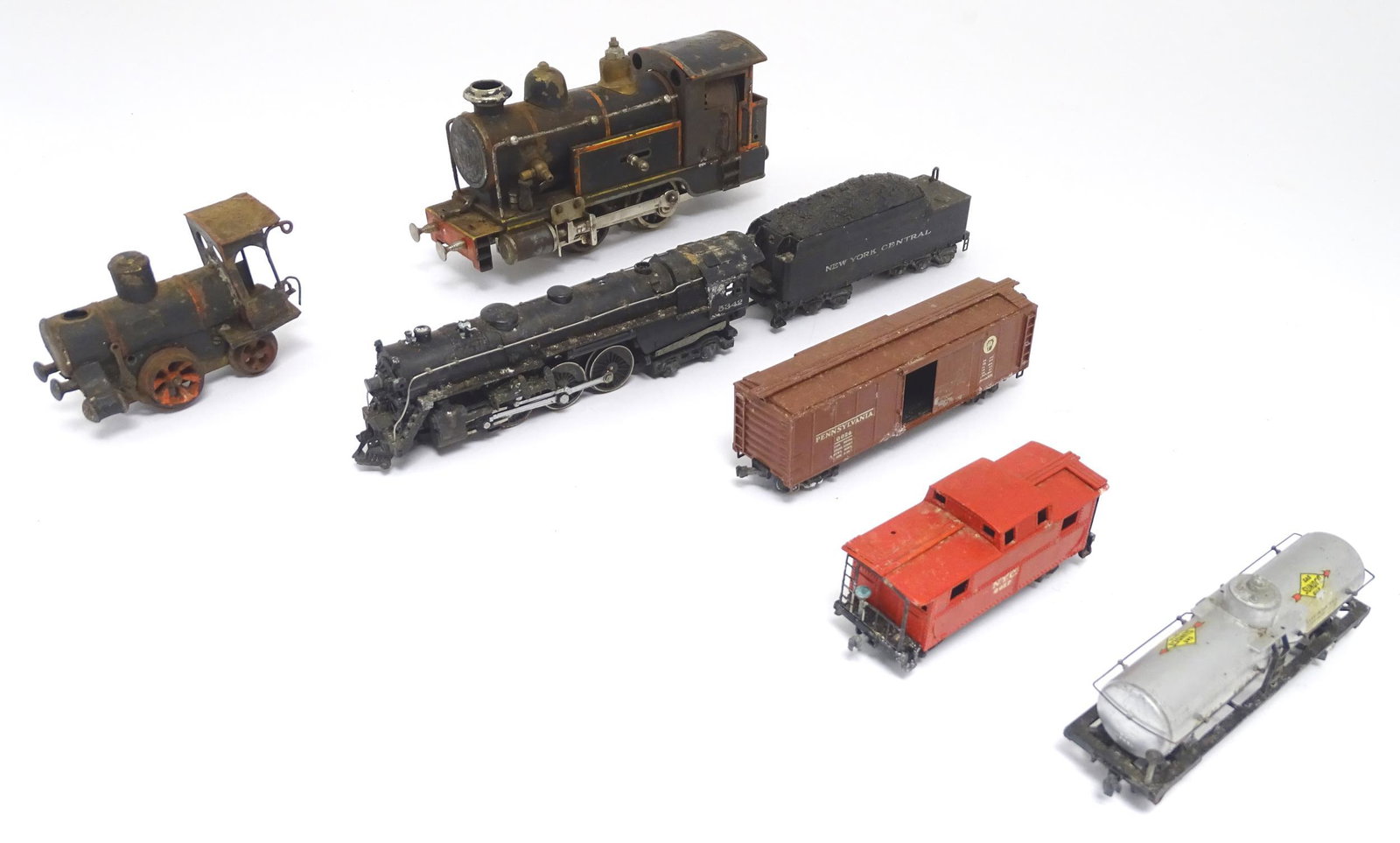 Toys: An early 20thC live steam tin plate locomotive / train by Gebruder Marklin (Germany) for A W: Toys: An early 20thC live steam tin plate locomotive / train by Gebruder Marklin (Germany) for A W Gamage of Holborn, London. Together with a quantity American The Lionel Corporation 00 gauge railway