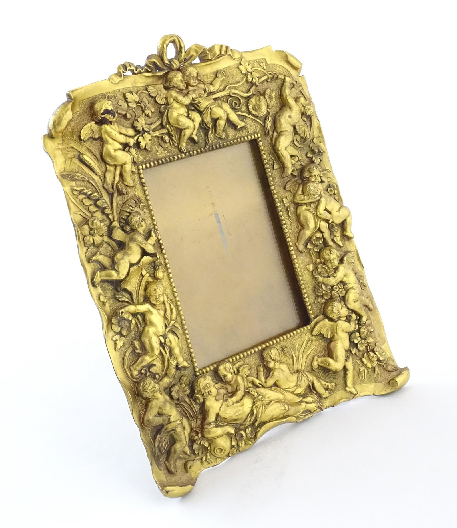 A late 19th / early 20thC Continental easel back photograph frame with cast and gilded surround (1 of 5)