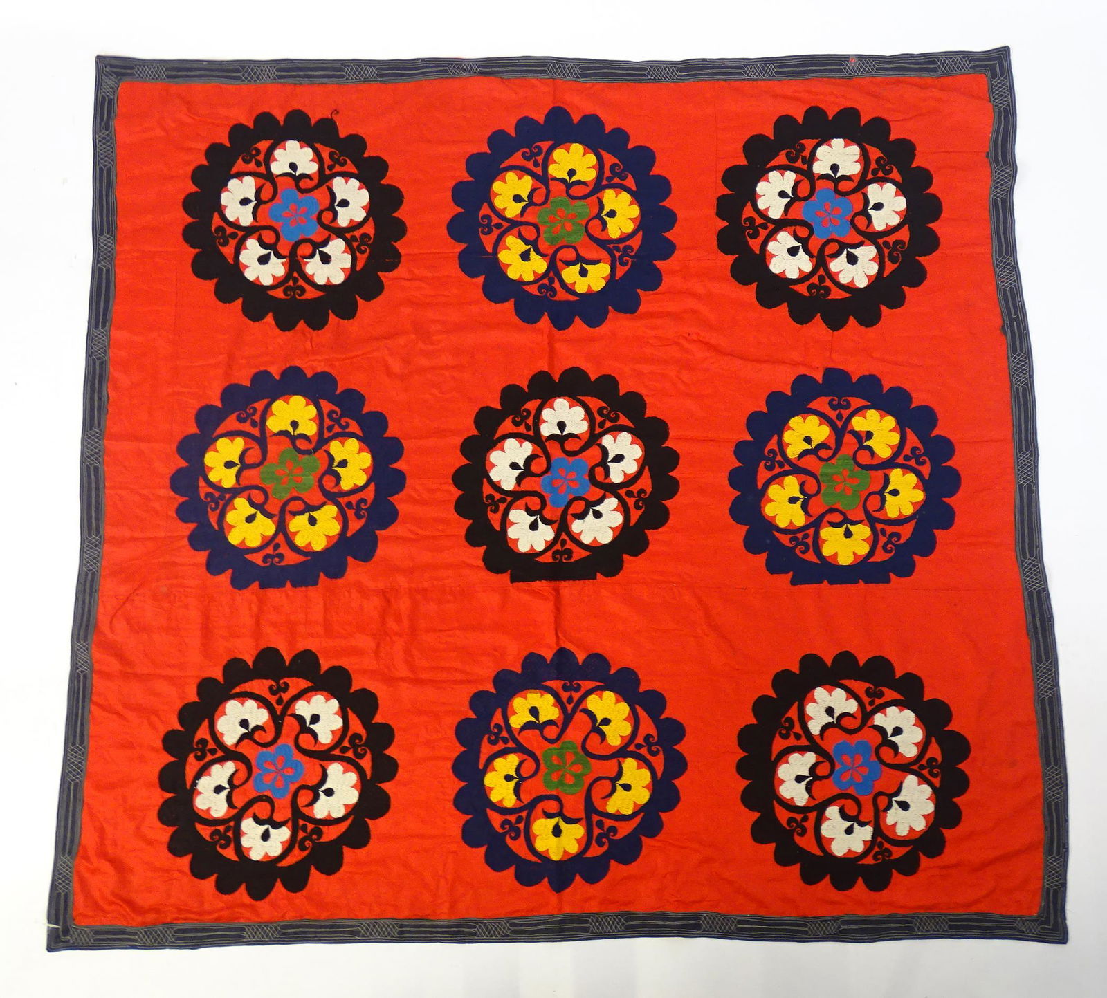 Carpet / Rug An Uzbek Suzani embroidery, the red ground with