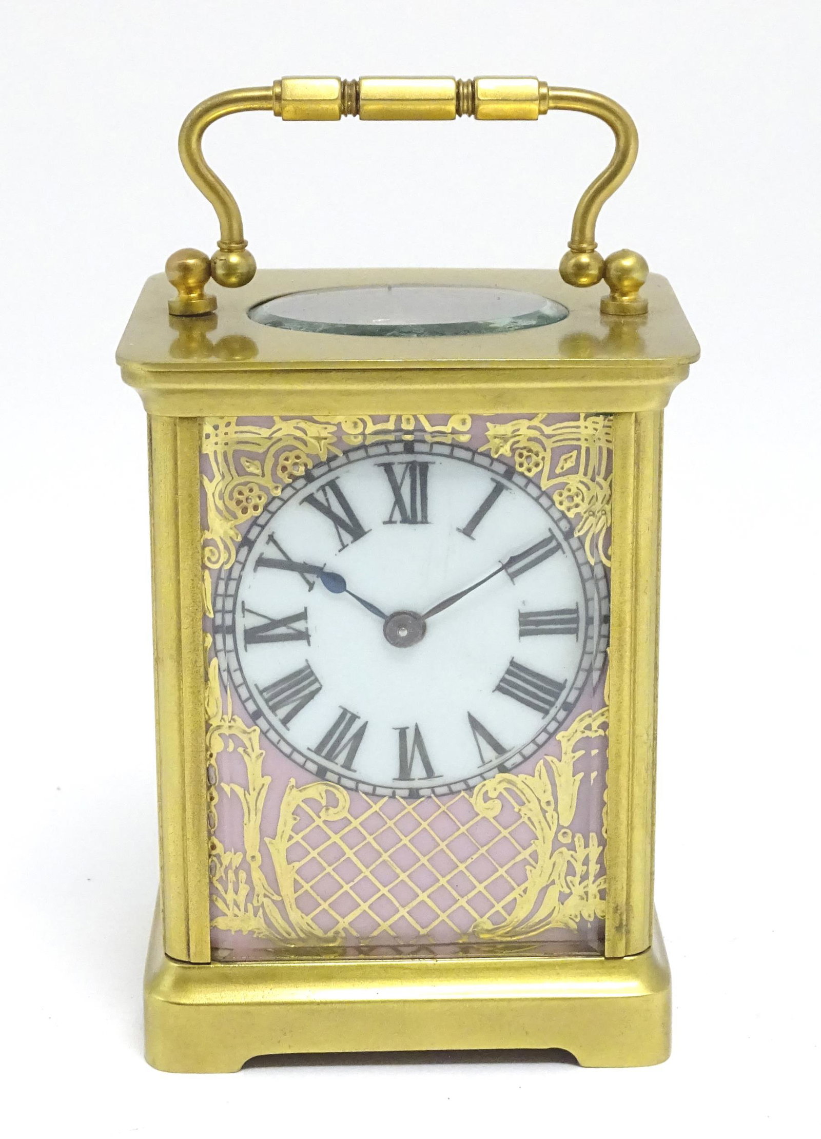 A French brass cased carriage clock with hand painted porcelain panels, the movement stamped ACC (1 of 9)