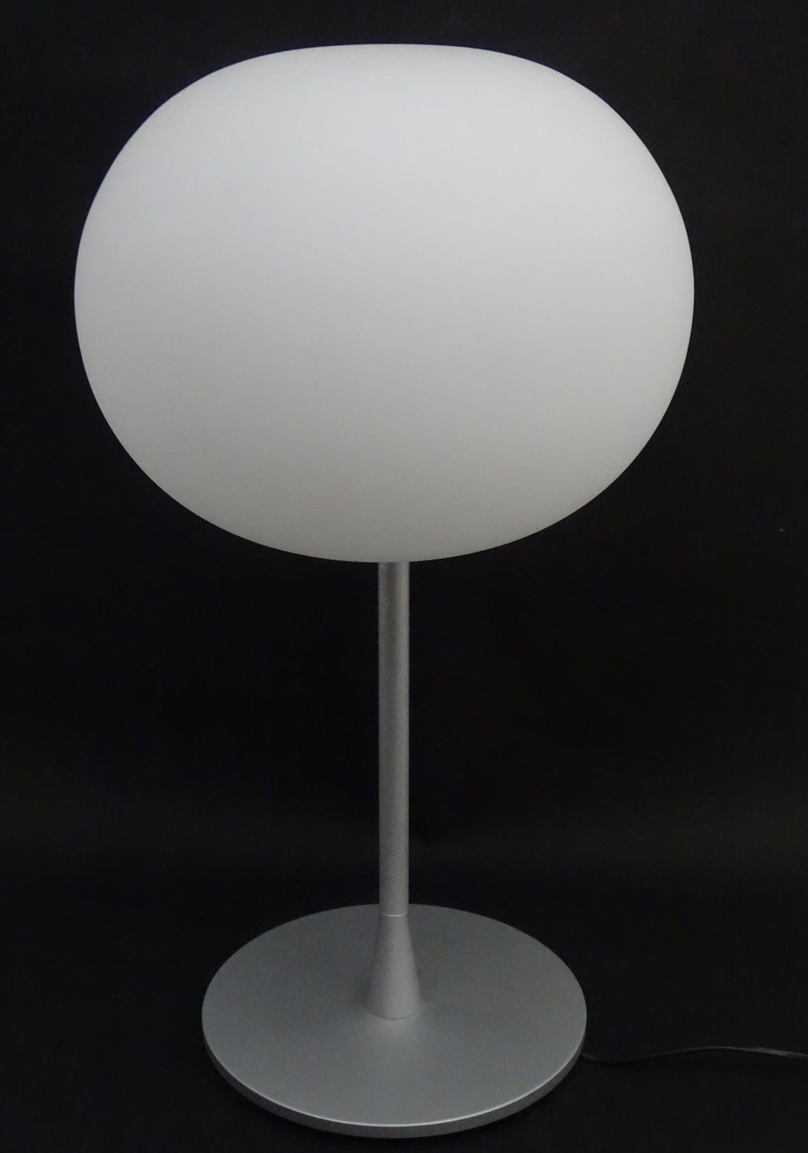 A Flos Glo-Ball table lamp with glass shade, designed by Jasper Morrison. Approx. 23" high Please: A Flos Glo-Ball table lamp with glass shade, designed by Jasper Morrison. Approx. 23" high Please Note - we do not make reference to the condition of lots within descriptions. We are however happy to
