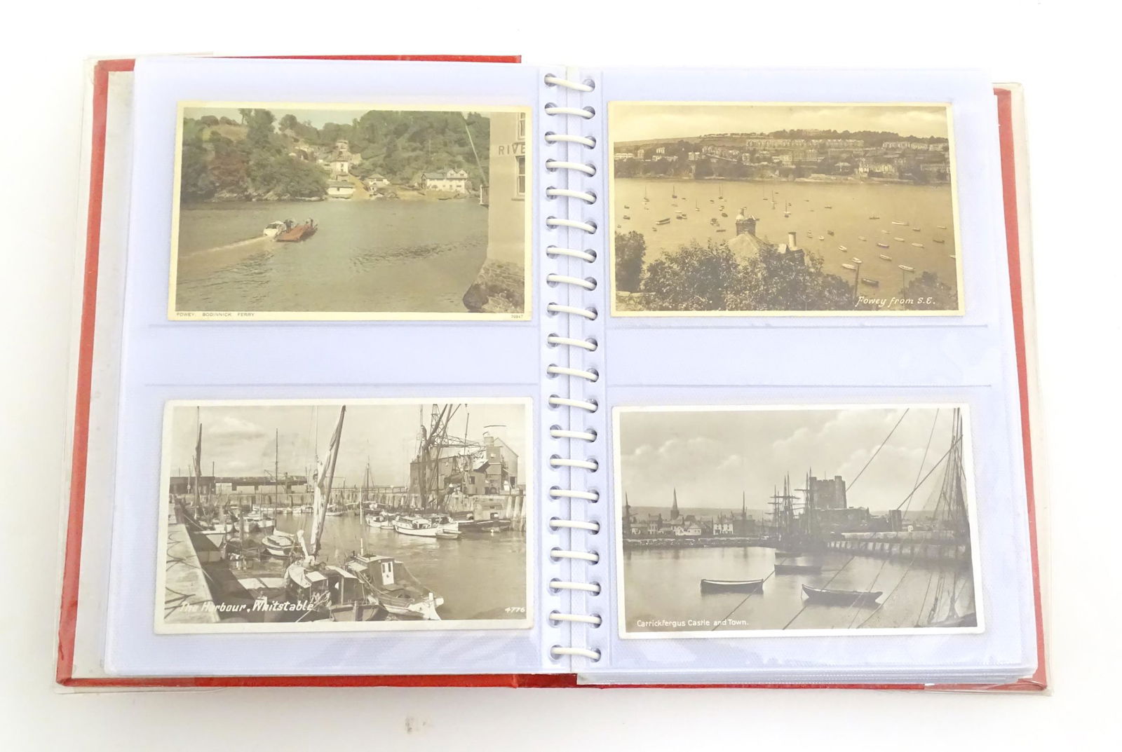 A 20thC postcard album containing various postcards to include Sandringham Church, the steam ships (1 of 9)