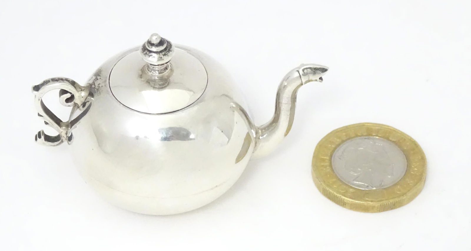 A .925 silver miniature model of a teapot. Approx. 2 1/4" widePlease Note - we do not make reference (1 of 7)