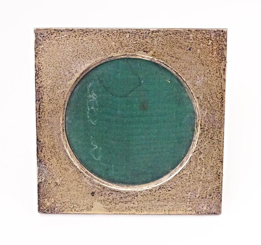 A Continental easel back photograph frame with .800 silver surround. Approx. 4 1/2" overall, (1 of 5)