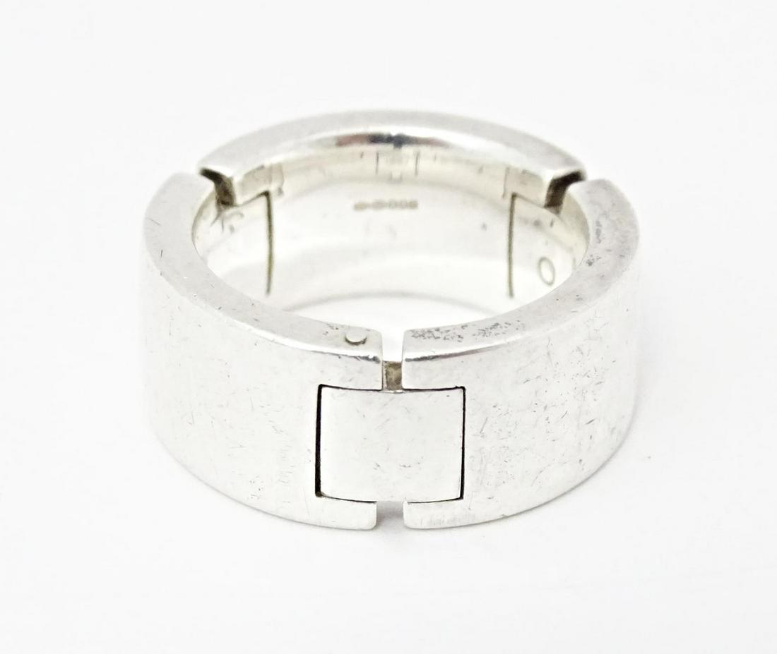 A hallmarked silver interlocking ring by Links of London, hallmarked London 2007. Ring size approx. (1 of 6)