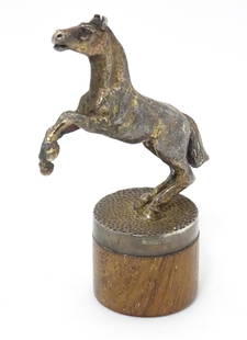 A silver model of a rearing horse / pony, hallmarked London 1978, maker Stuart Devlin. Approx. 3: A silver model of a rearing horse / pony, hallmarked London 1978, maker Stuart Devlin. Approx. 3 1/4" high overall