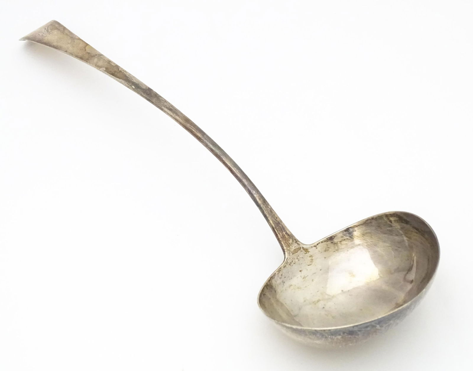 A Geo III Old English pattern soup ladle. Hallmarked London 1803 maker Christopher & Thomas Wilkes: A Geo III Old English pattern soup ladle. Hallmarked London 1803 maker Christopher & Thomas Wilkes Barker. Approx 13 1/4" longPlease Note - we do not make reference to the condition of lots within des