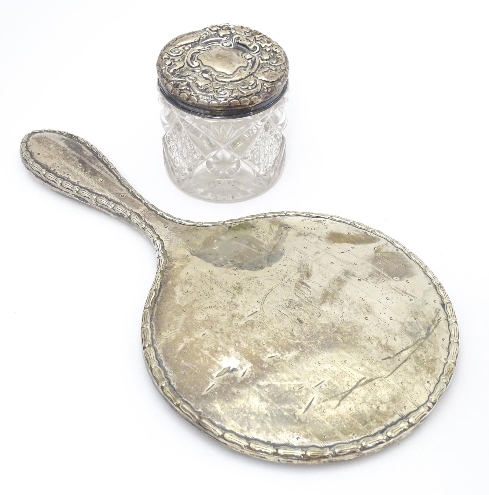 A silver hand mirror and together with a silver topped glass dressing table pot. 2 1/2" high  (2) (1 of 8)