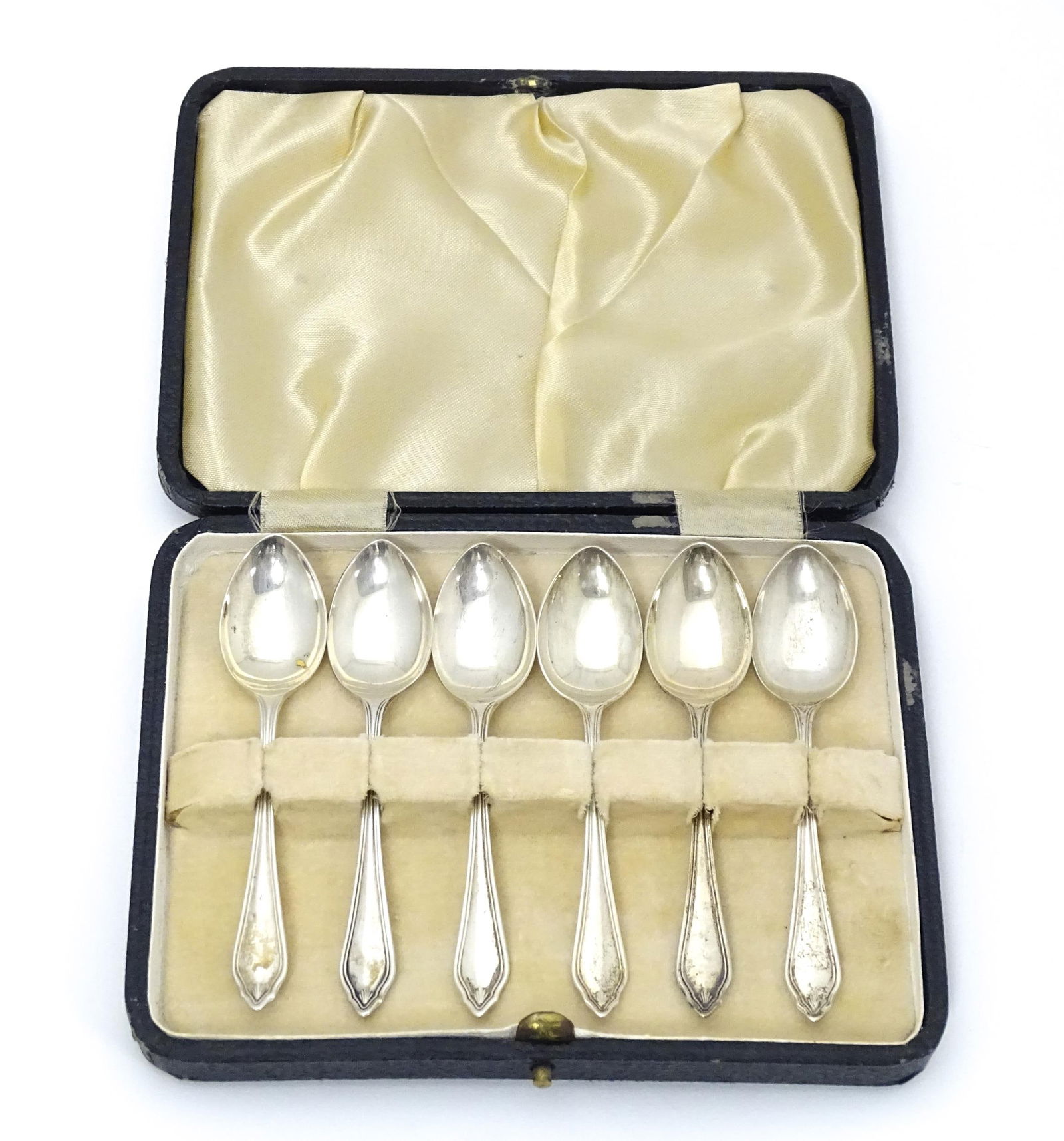 A cased set of six silver teaspoons hallmarked Sheffield 1943, maker EJE. Approx. 4 1/4" long Please (1 of 7)