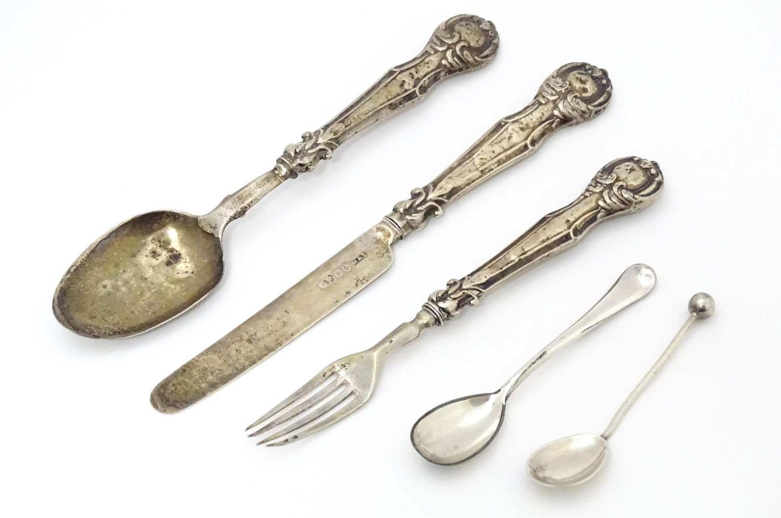 Assorted items to include silver handled christening knife, fork and spoon, a silver salt spoon and (1 of 10)
