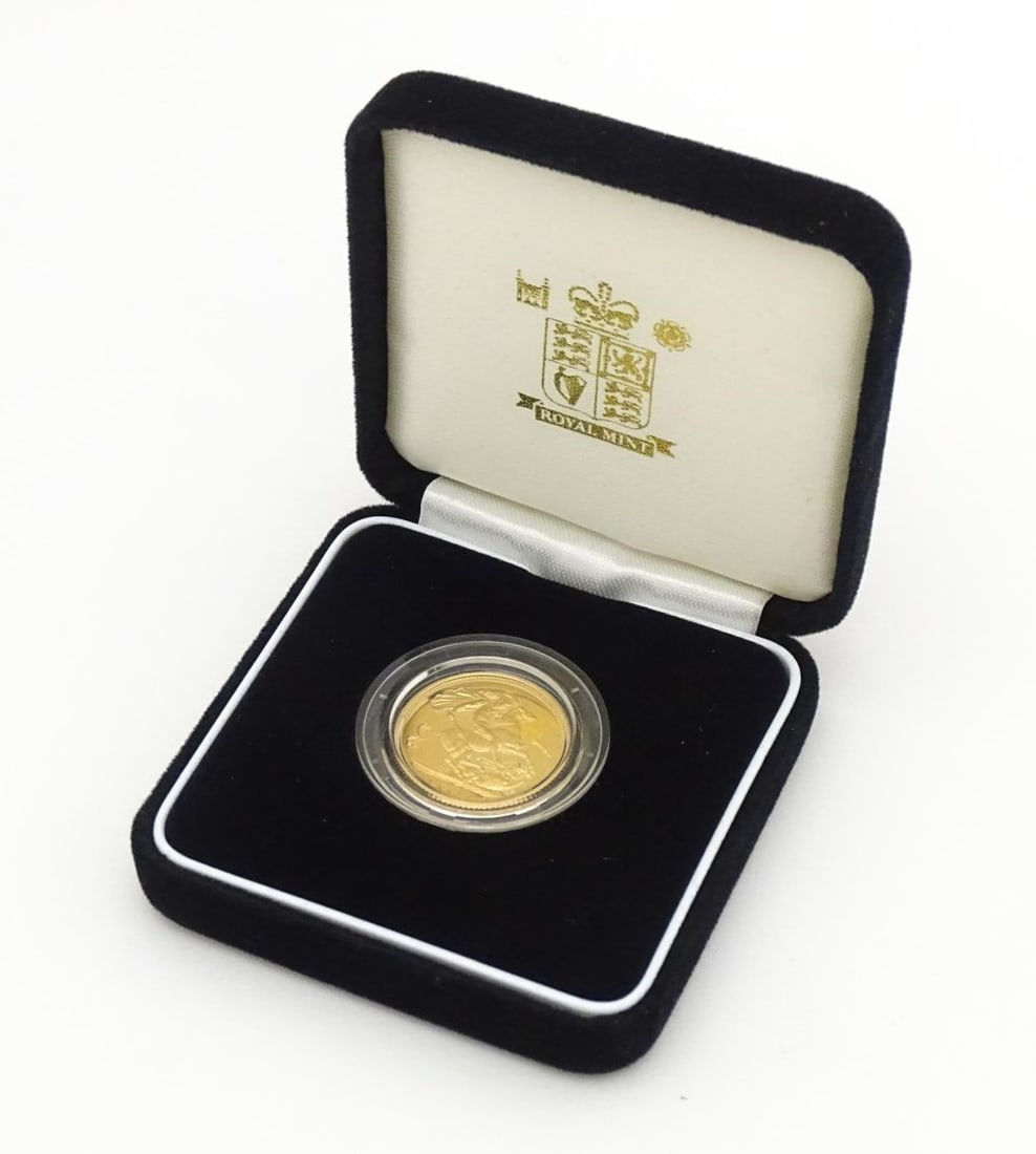 Coin: A 2003 gold proof sovereign coin. Cased. Please Note - we do not make reference to the (1 of 9)