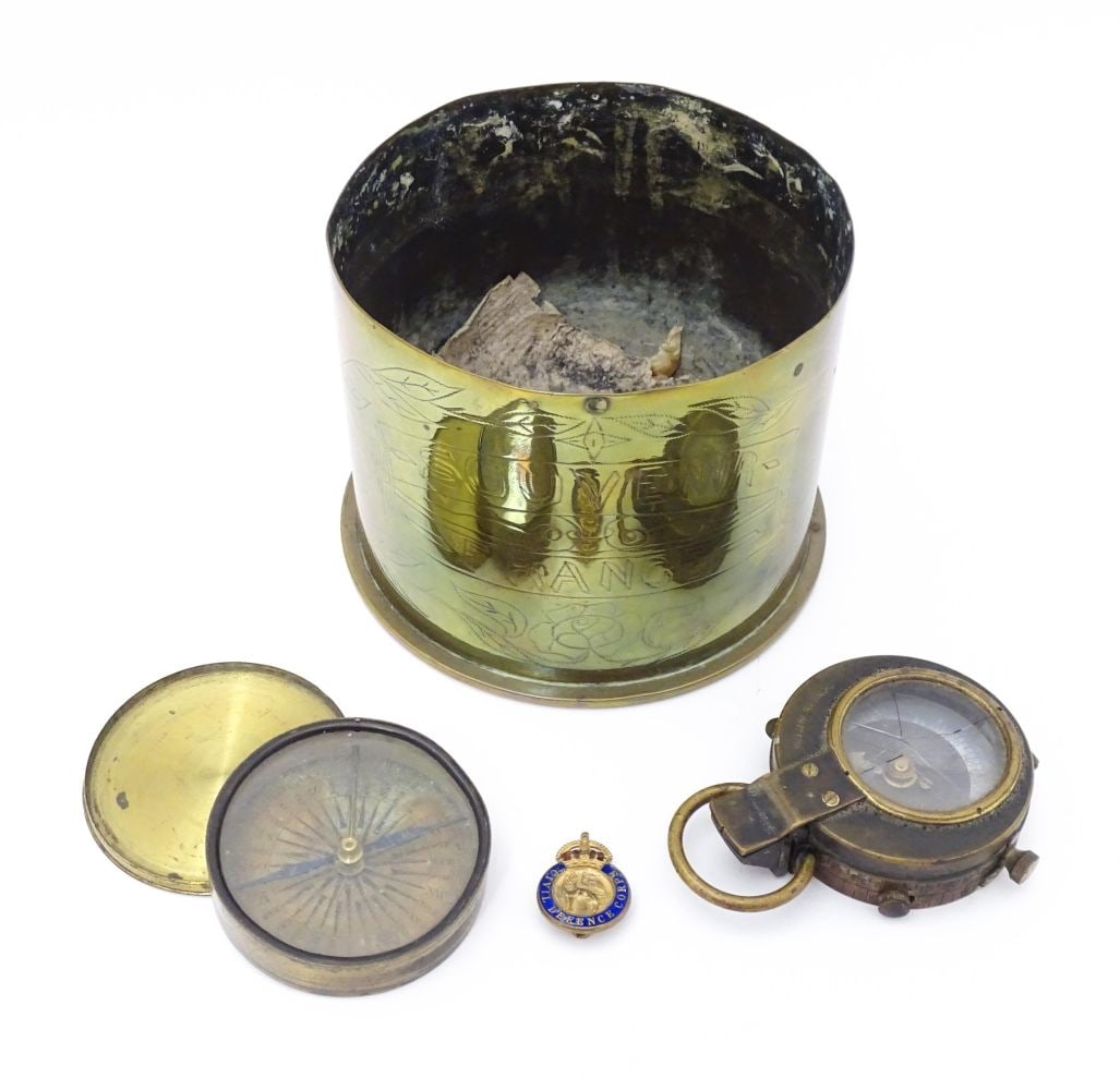 Militaria : WWI / WW1 / World War One / First World War : a trenchart Germany artillery shell case,: Militaria : WWI / WW1 / World War One / First World War : a trenchart Germany artillery shell case, decorated with roses and marked 'Souvenir France', together with a Vernon's Pattern compass (the rev