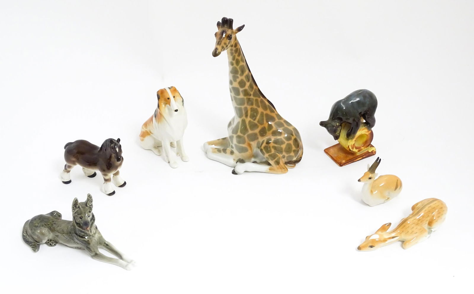 A quantity of assorted Russian ceramic models of animals to include giraffe, horse, bear, deer, dog, (1 of 20)