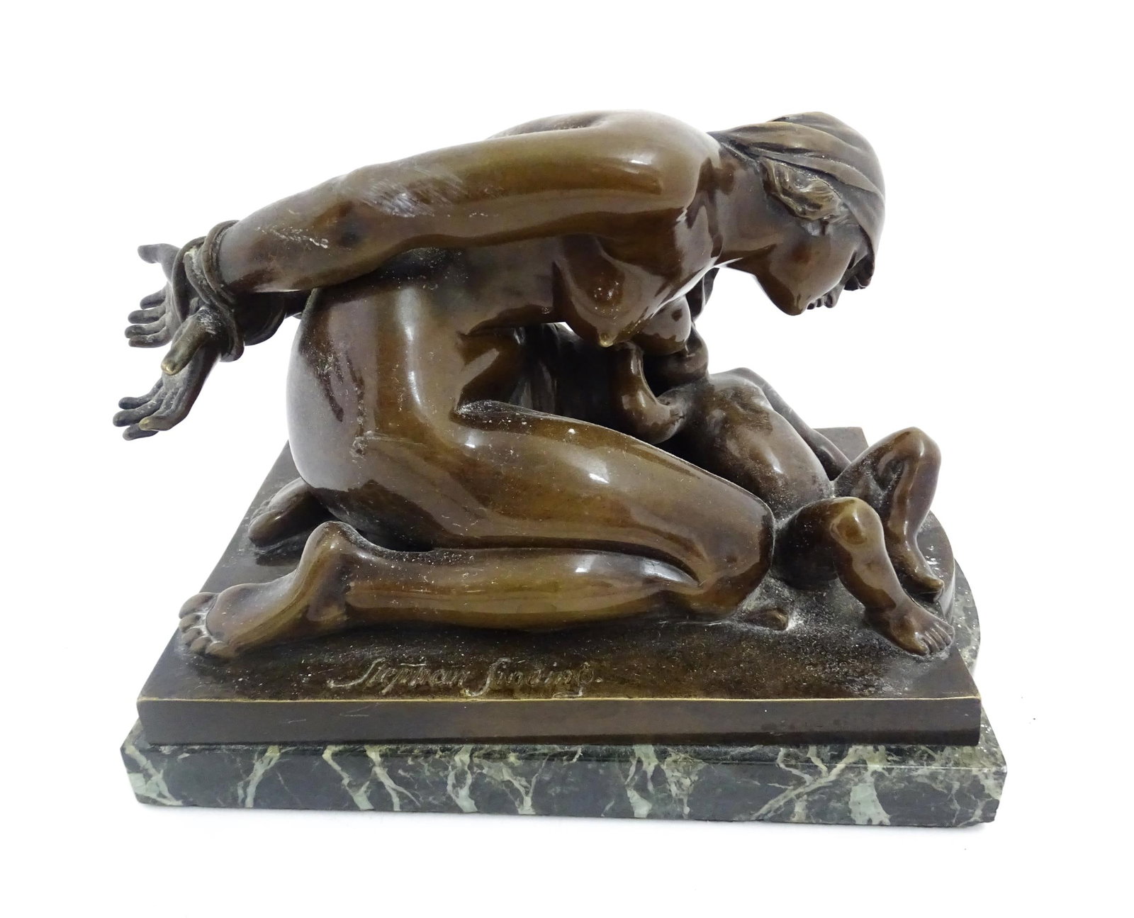 An early 20thC Scandinavian bronze figure group, Captive Mother after Stephan Abel Sinding. Cast (1 of 6)