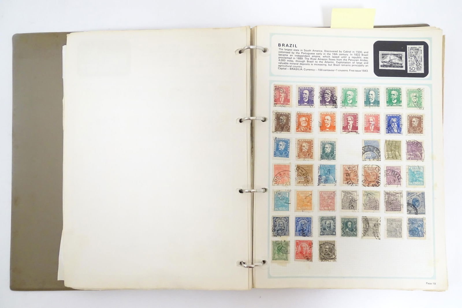 A stamp album containing Victorian and early to mid 20thC British, colonial and worldwide postage (1 of 12)