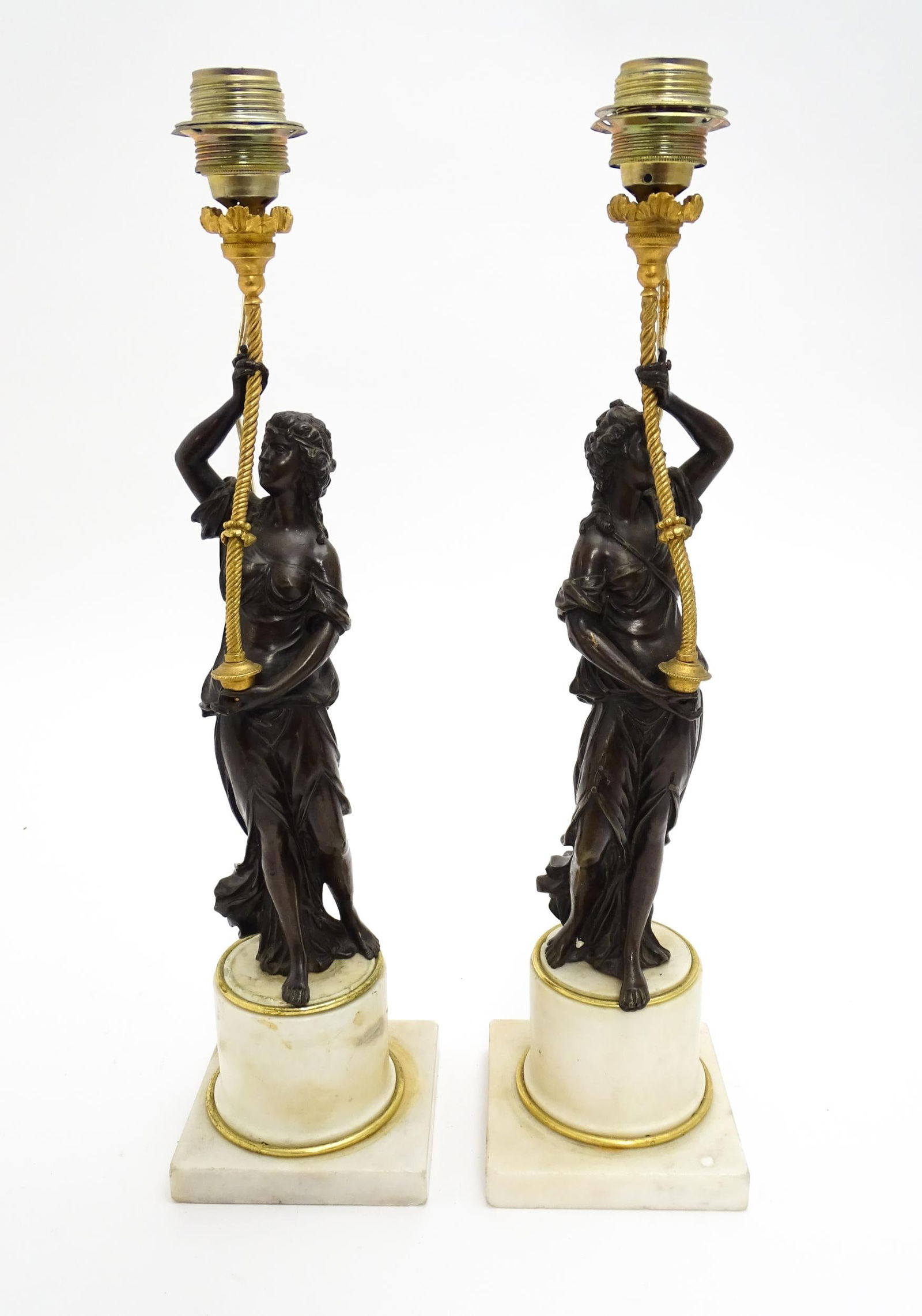 A pair of 19thC table lamps formed as Classical maidens mounted on turned marble plinths. Approx. 21 (1 of 10)