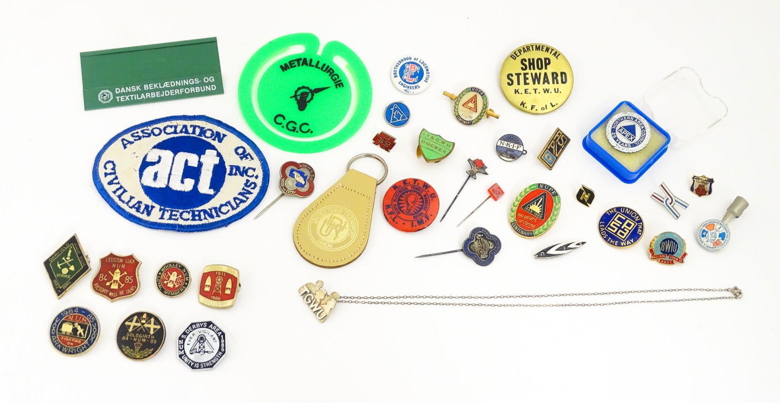 Trade Union Interest: a quantity of assorted badges, pins, etc. to include a Transport & General: Trade Union Interest: a quantity of assorted badges, pins, etc. to include a Transport & General Workers Union silver pendant, hallmarked Sheffield 1986 maker Jack Spencer Ltd, together with Arkwright