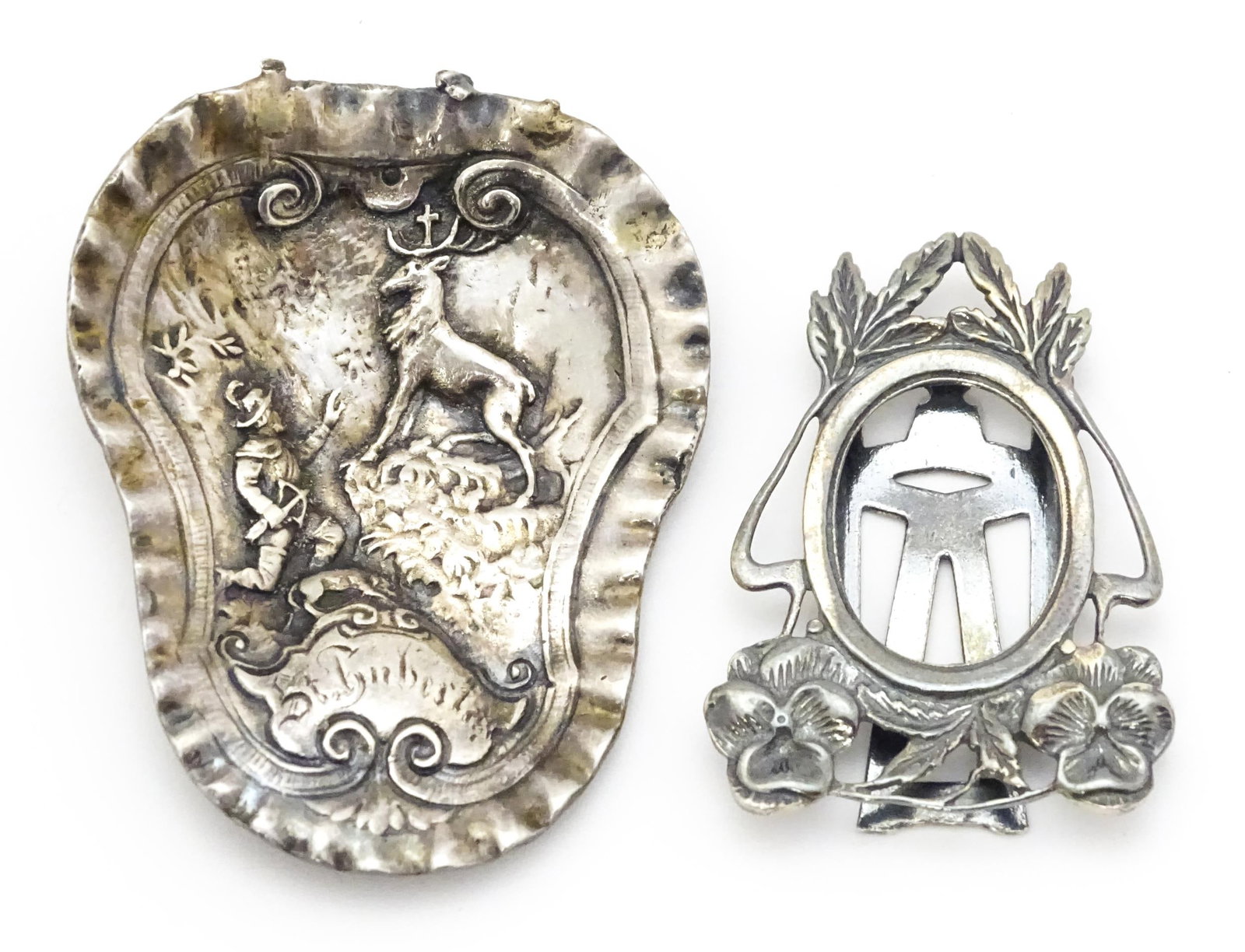 A miniature silver photograph frame with clip back, maker Arni Norman. Together with a Continental (1 of 7)