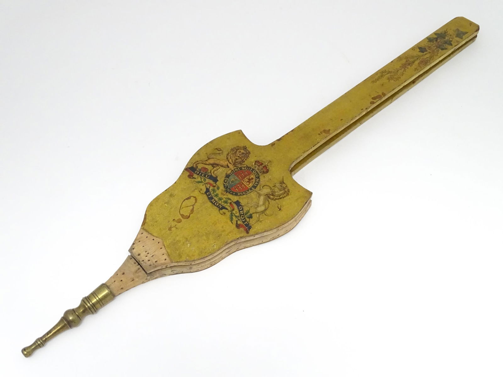 Early 20thC long handled bellows bearing the Royal Coat of Arms and decorated with flowers and: Early 20thC long handled bellows bearing the Royal Coat of Arms and decorated with flowers and foliage to handle. Approx. 35 1/2" long Please Note - we do not make reference to the condition of lots w