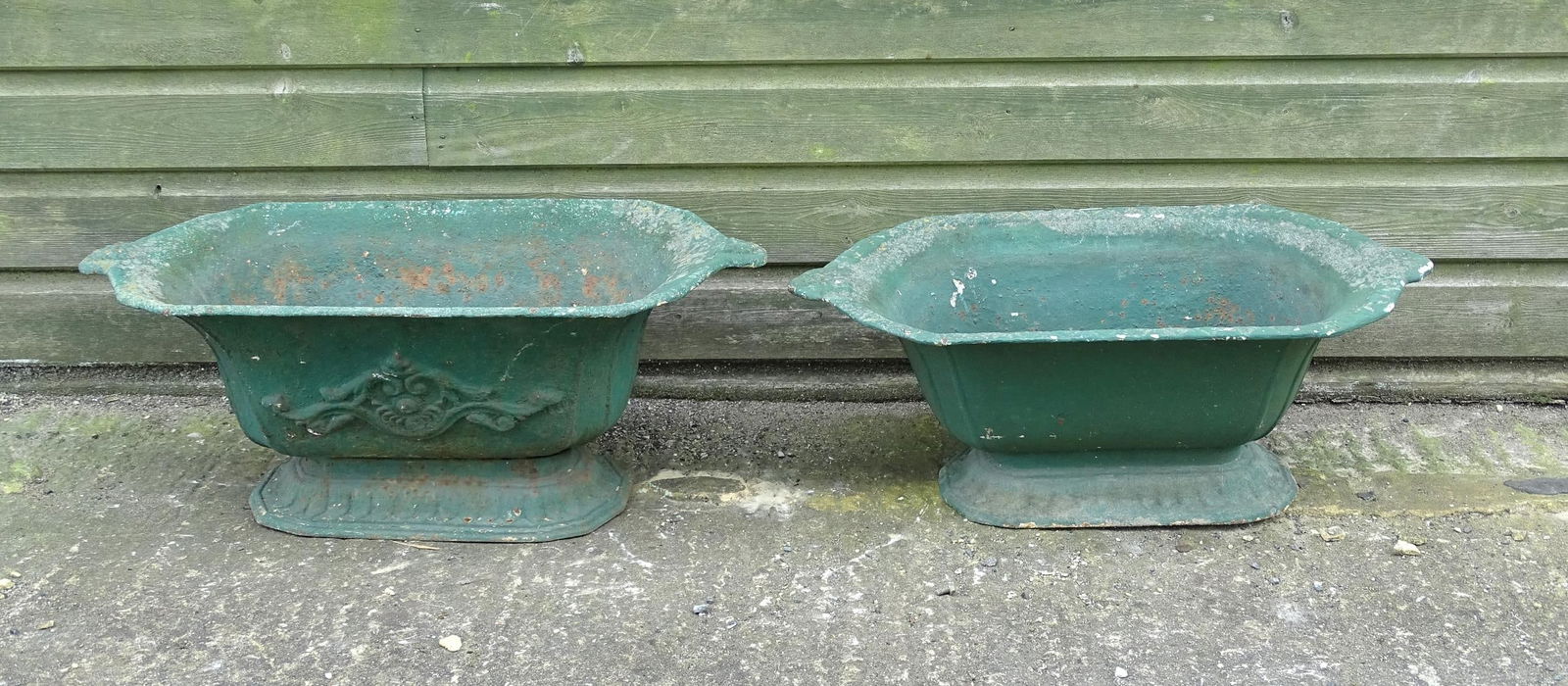 Two early 20thC cast iron pedestal planters / urns, one with relief detail. Approx. 26" wide x 10" (1 of 8)