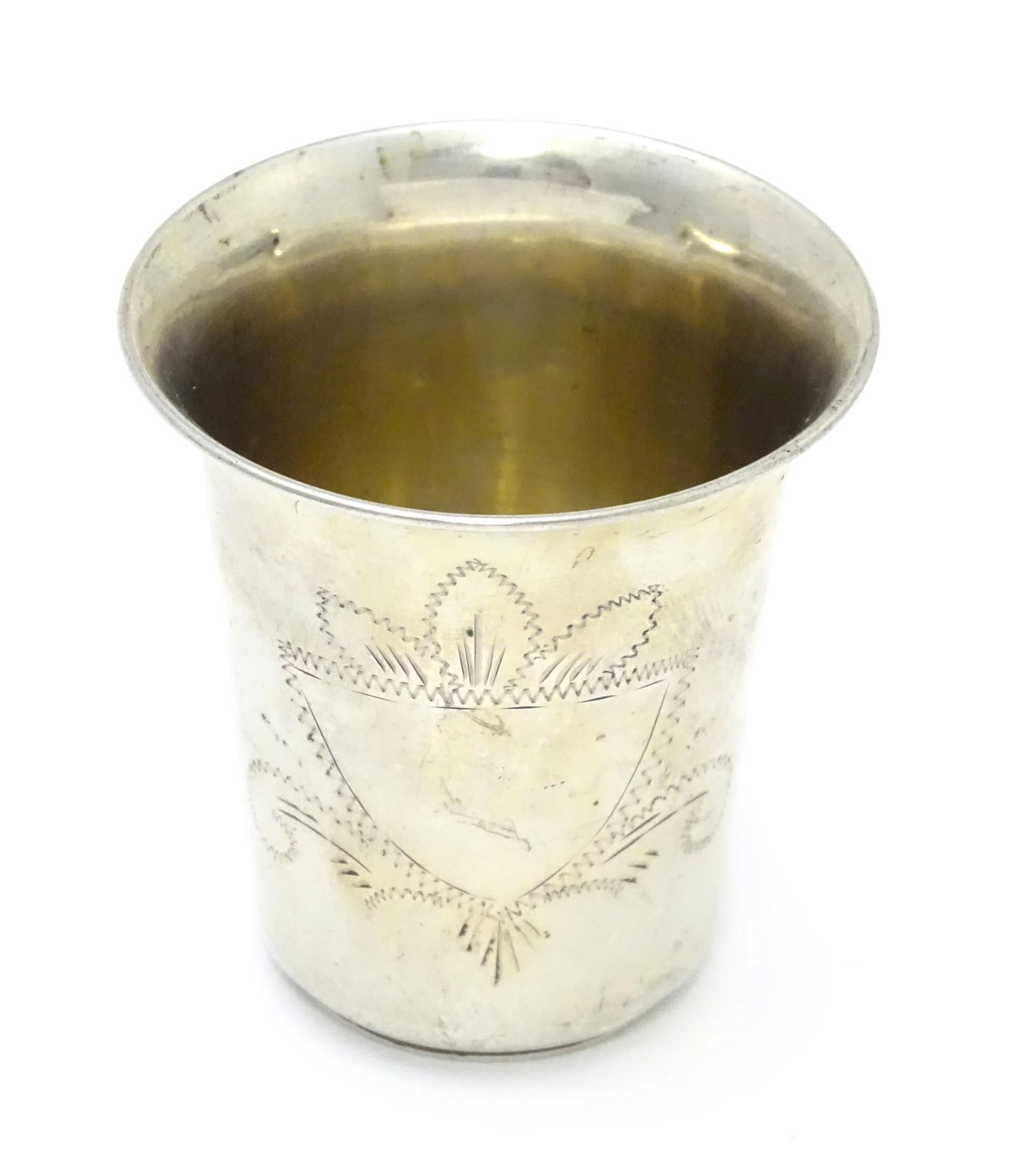 A .800 silver beaker with engraved decoration. Possibly Israeli. Approx. 2 1/2" high Please Note -: A .800 silver beaker with engraved decoration. Possibly Israeli. Approx. 2 1/2" high Please Note - we do not make reference to the condition of lots within descriptions. We are however happy to provid