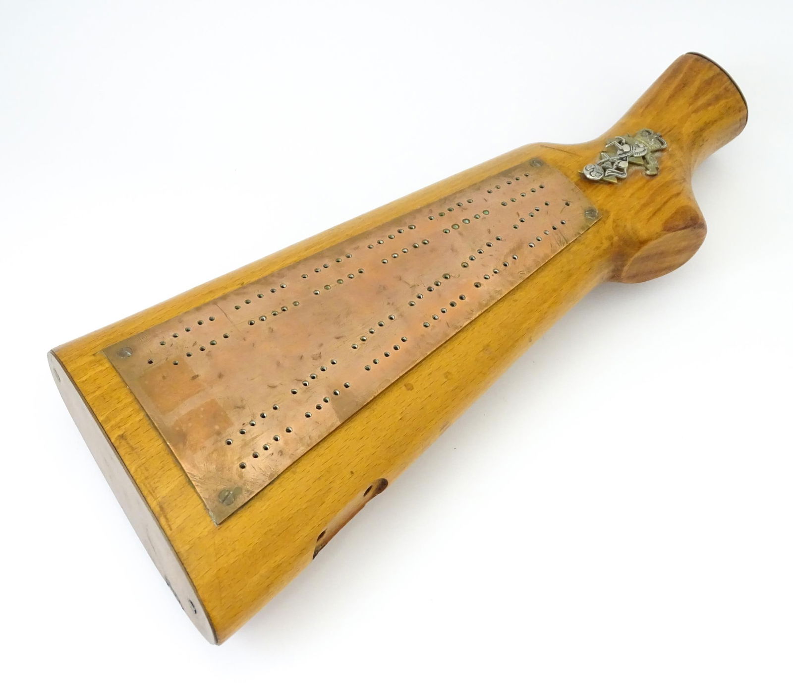 Militaria : a 20thC cribbage board constructed from a gunstock, the top with affixed Royal (1 of 5)