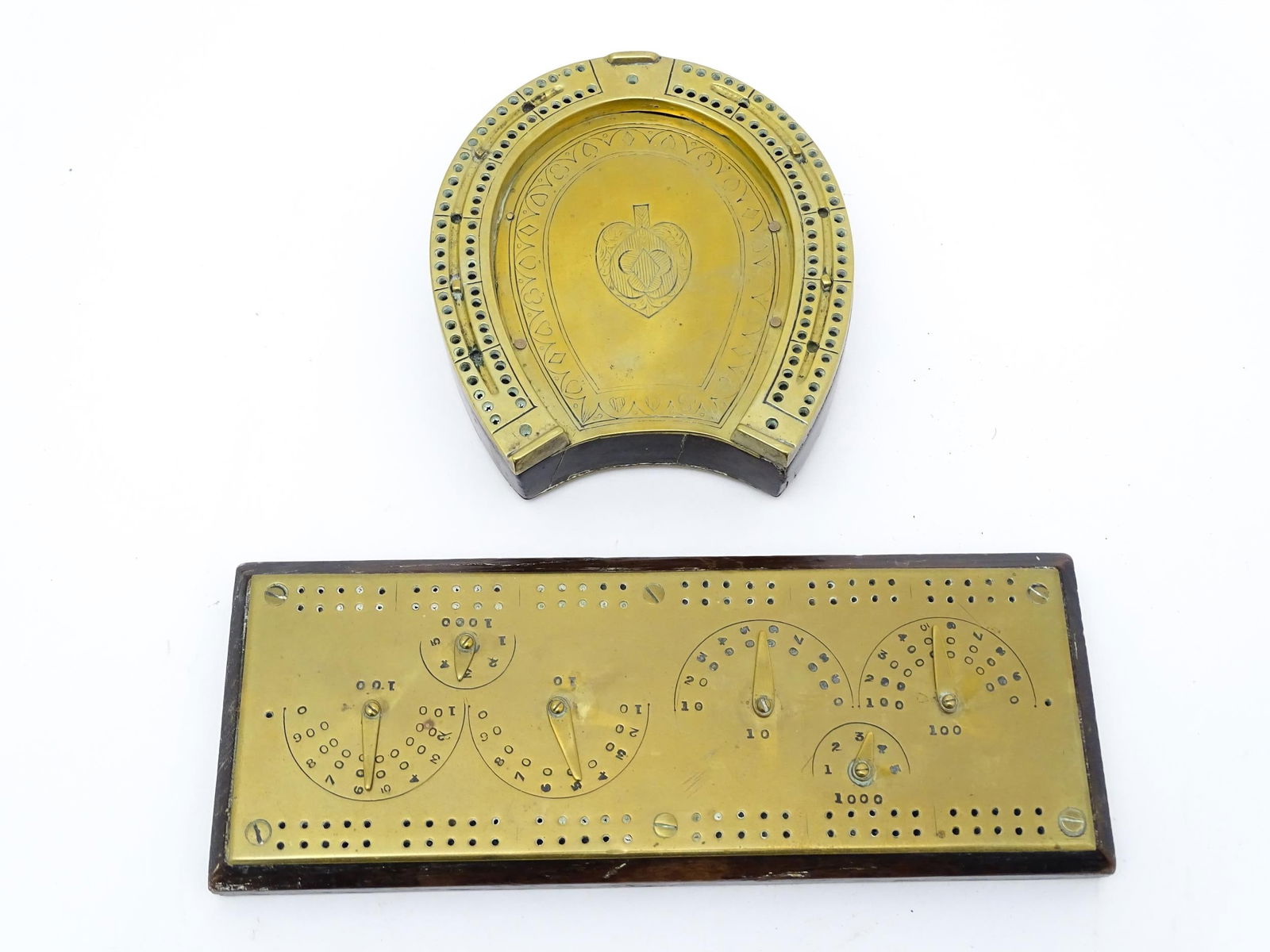 Toys: A 19thC mahogany and brass playing card box of horseshoe form with cribbage board to top, with (1 of 9)