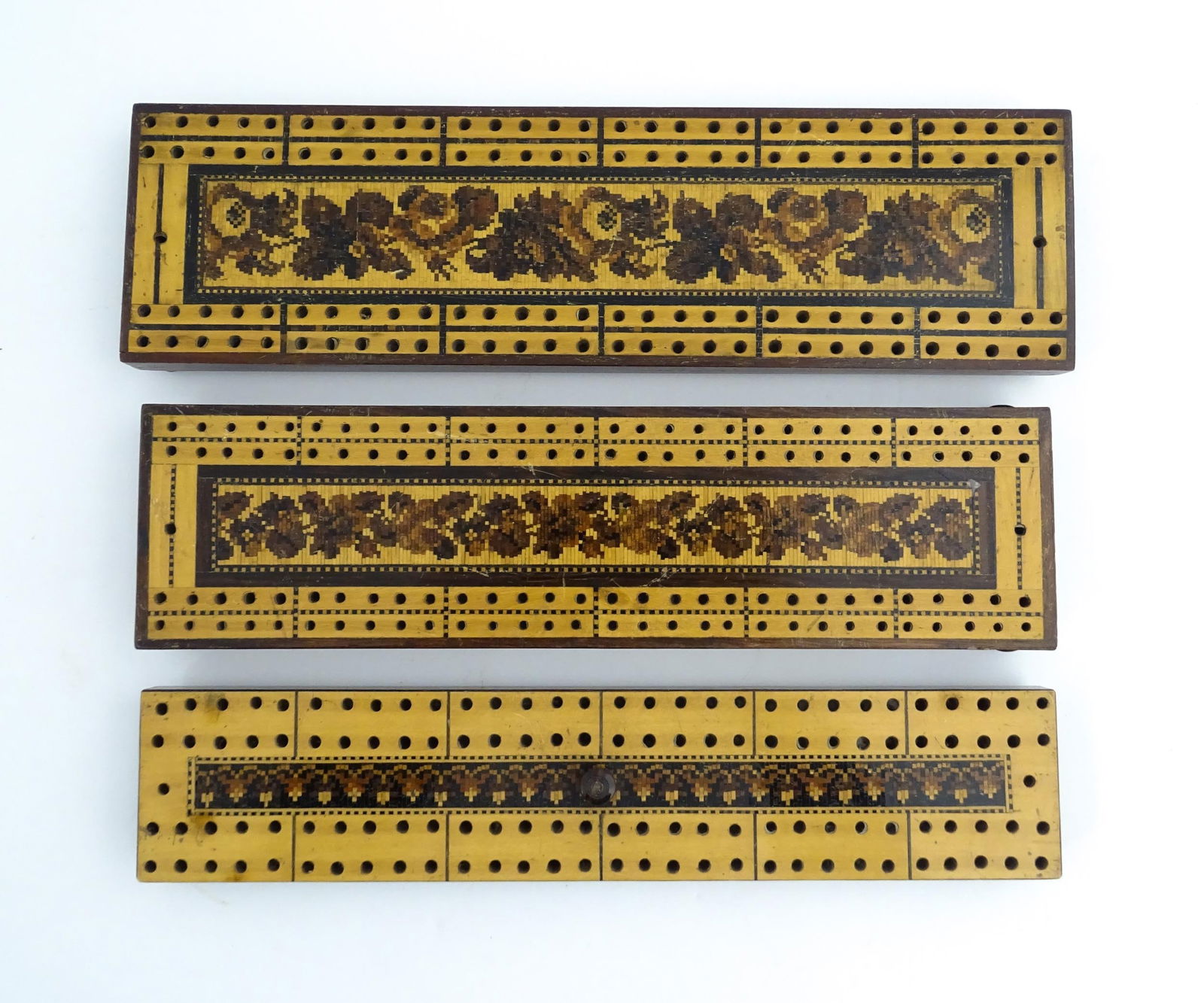 Treen: Three Tunbridge ware cribbage boards with central floral decoration. Largest approx. 10" long (1 of 20)