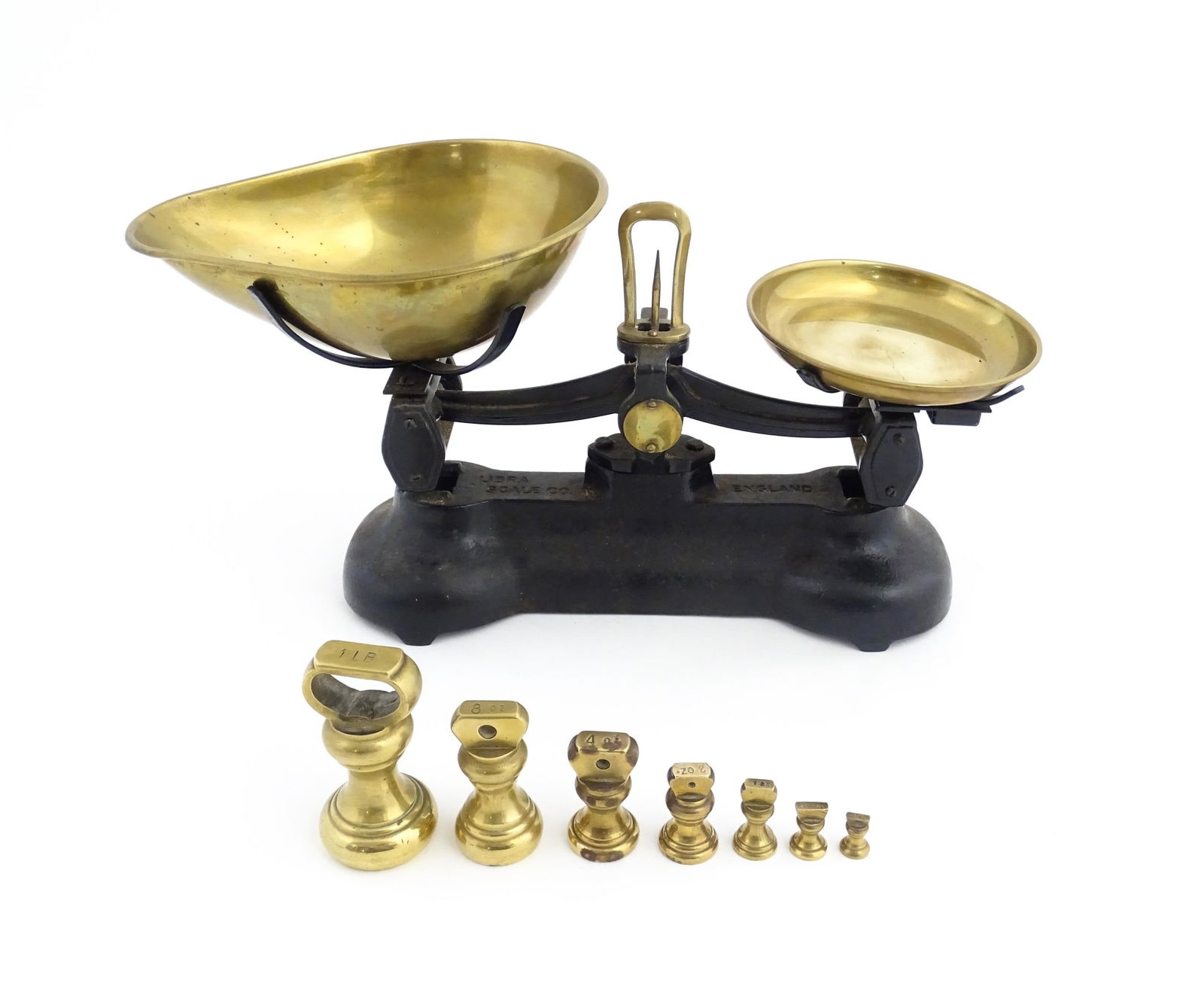 Early 20thC cast iron and brass Libra Scale Co. balance scales. Together with seven brass weights. (1 of 15)