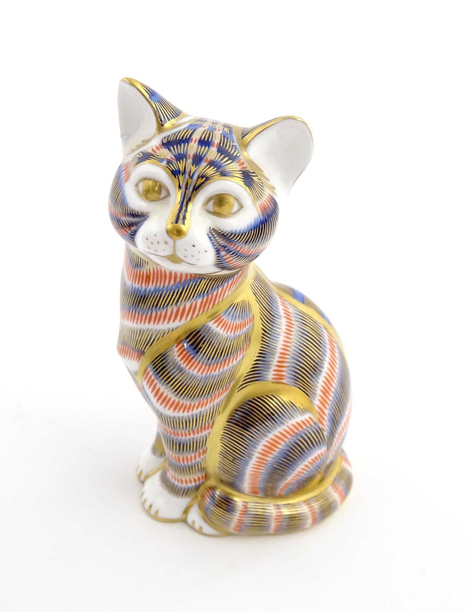A Royal Crown Derby paperweight modelled as a seated cat. Marked under. Approx. 5" high: A Royal Crown Derby paperweight modelled as a seated cat. Marked under. Approx. 5" highPlease Note - we do not make reference to the condition of lots within descriptions. We are however happy to prov