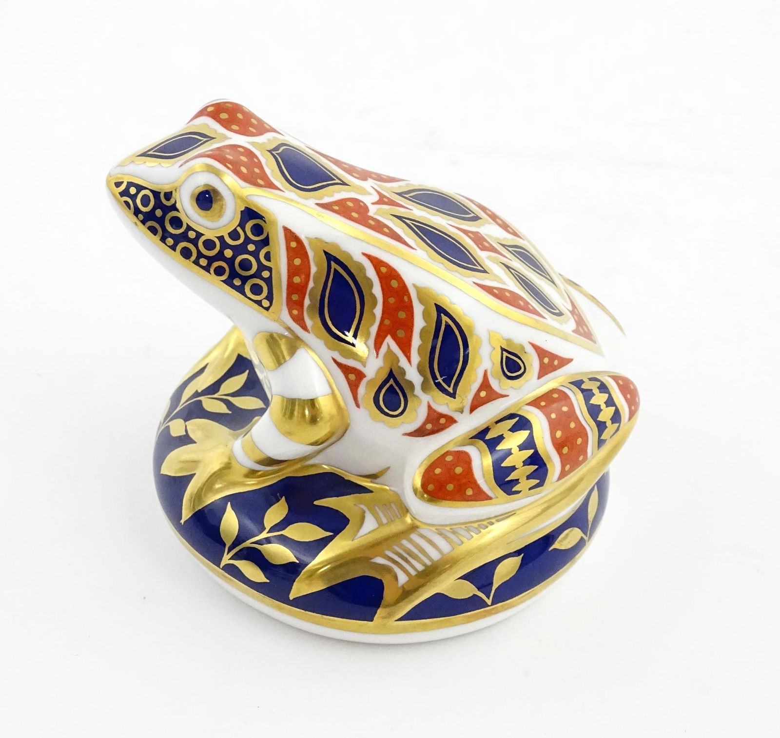 A Royal Crown Derby paperweight modelled as a frog. Marked under. Approx. 3" high: A Royal Crown Derby paperweight modelled as a frog. Marked under. Approx. 3" highPlease Note - we do not make reference to the condition of lots within descriptions. We are however happy to provide ad
