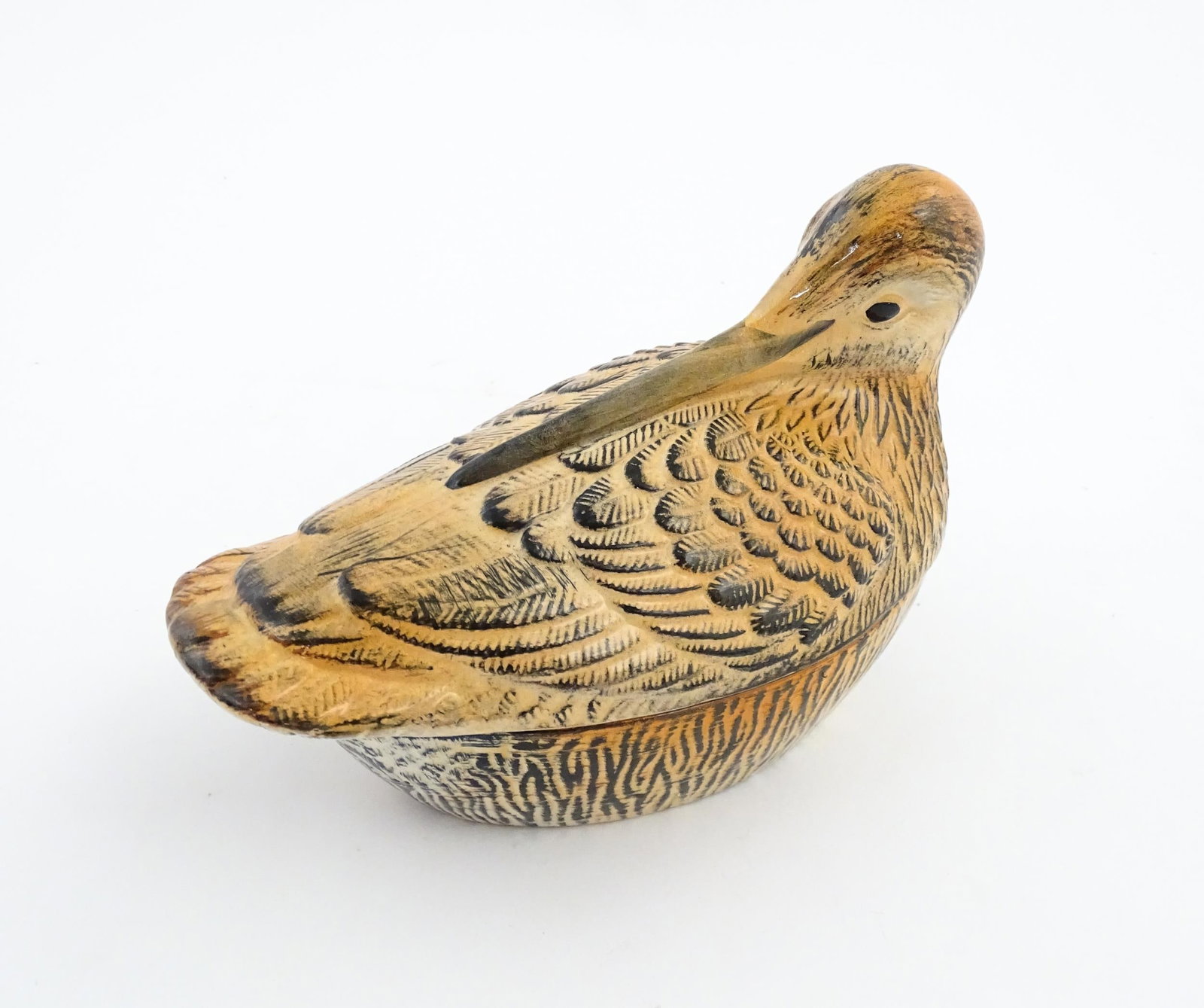 A small French pate terrine modelled as a snipe / woodcock by Michel Caugant. Marked under. Approx.: A small French pate terrine modelled as a snipe / woodcock by Michel Caugant. Marked under. Approx. 6 3/4" highPlease Note - we do not make reference to the condition of lots within descriptions. We a